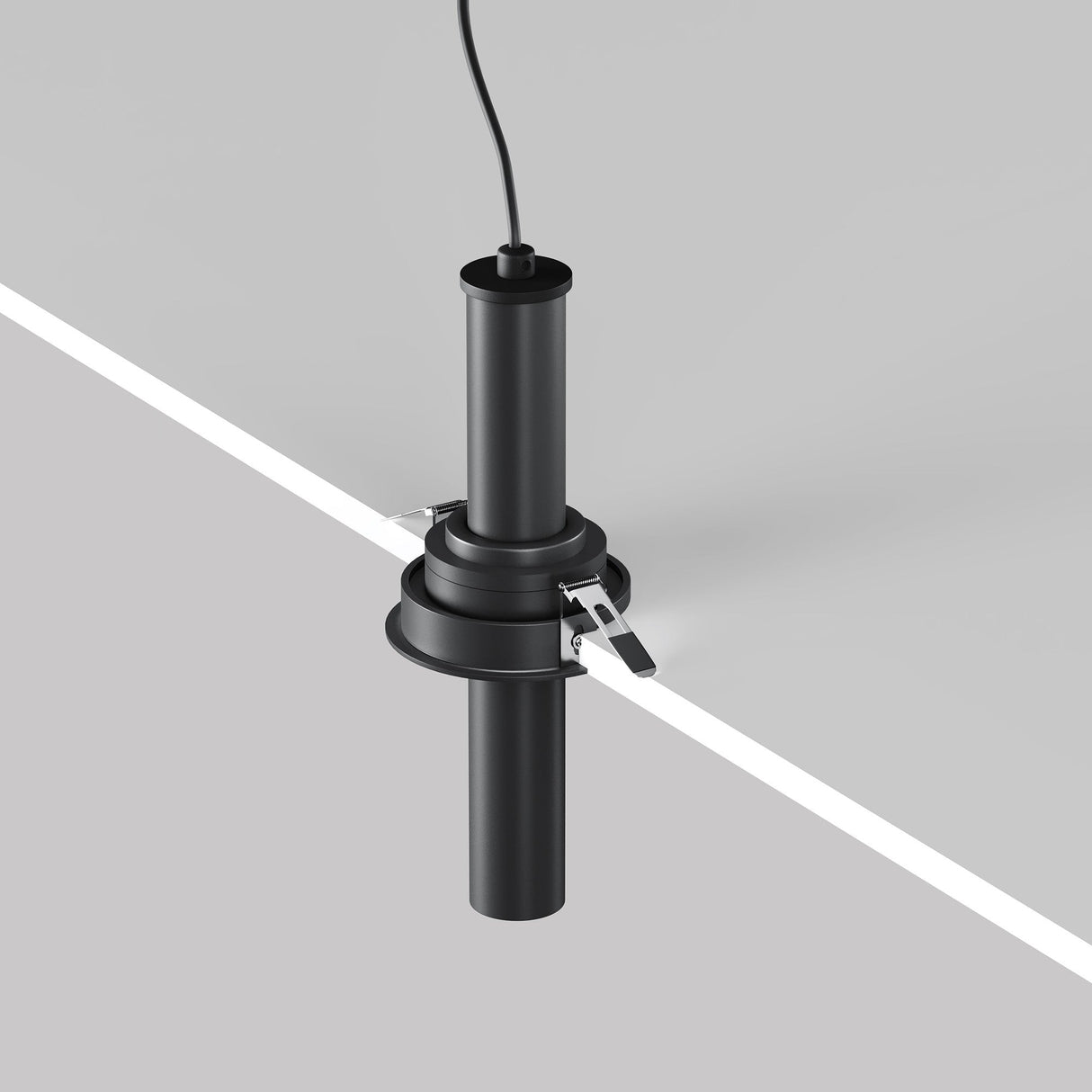 A Focus T LED Adjustable Short Retractable In-Out Recessed Downlight 7W 3000K - Black is mounted at the junction of two flat surfaces, connected by a cable above and secured with metal brackets below.