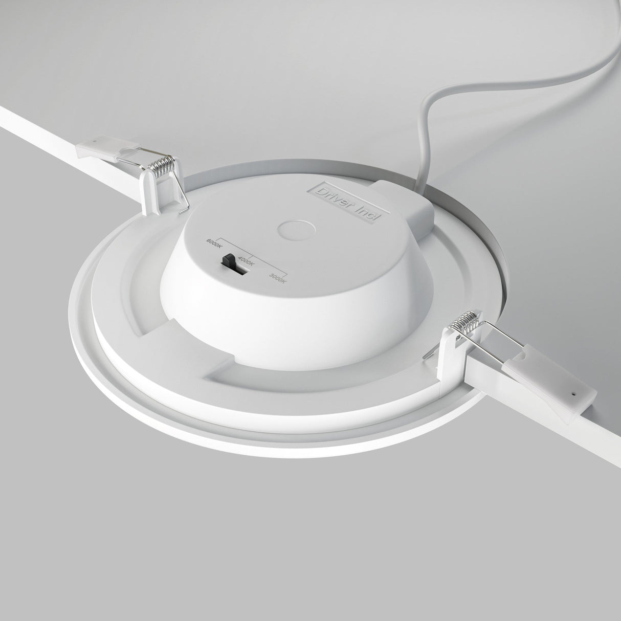 A close-up shows the Stockton CCT LED Round Recessed Downlight 12W in white, partially installed, featuring adjustable brightness and warmth settings (3000-6000K) with precise color temperature control, visible switches, labeled housing, spring clips, and wiring.