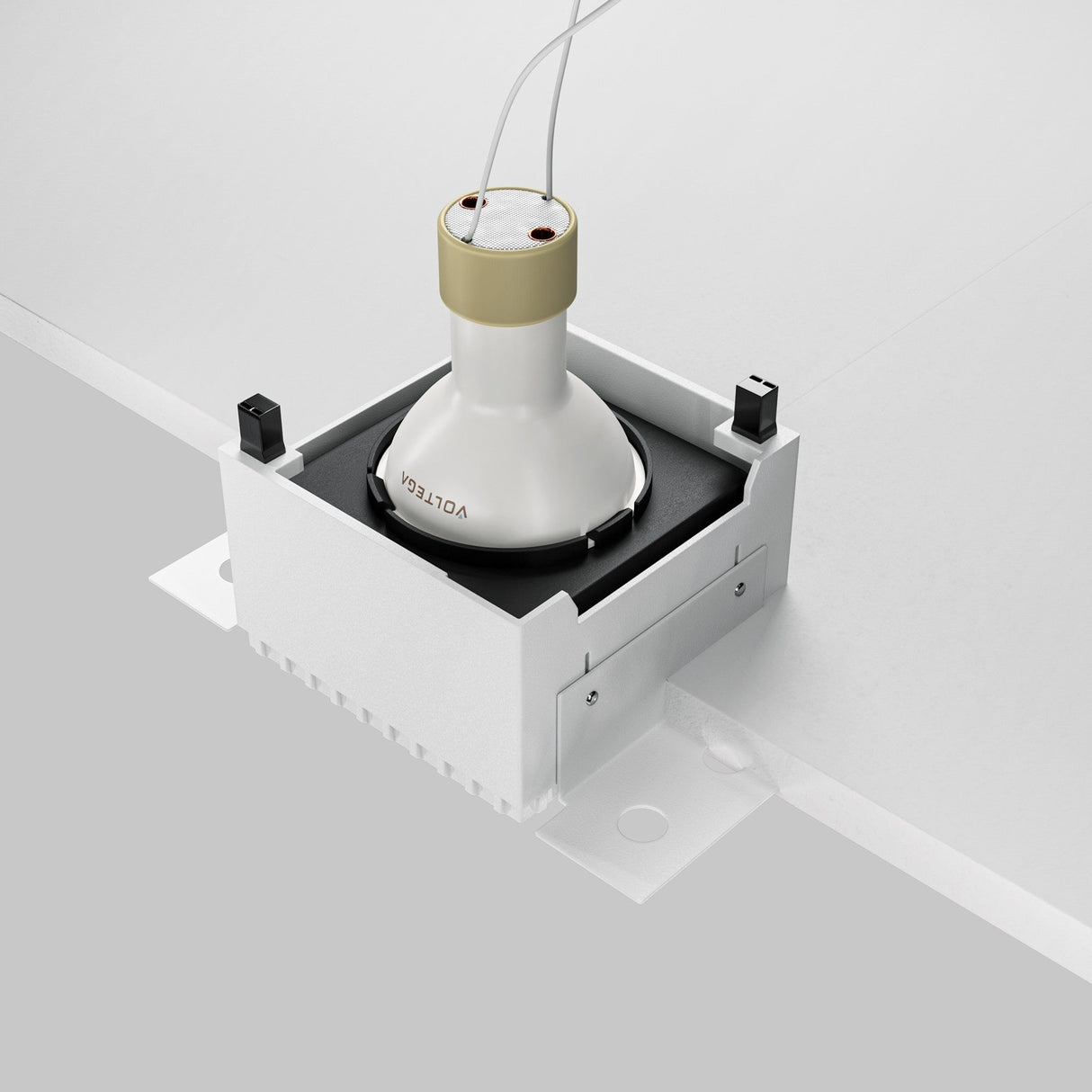 A Share Square Plaster-in Fixed Recessed Downlight in black is mounted vertically within a ceilings white rectangular metal frame, featuring elegant recessed lighting and easy wire access for plaster-in installation.