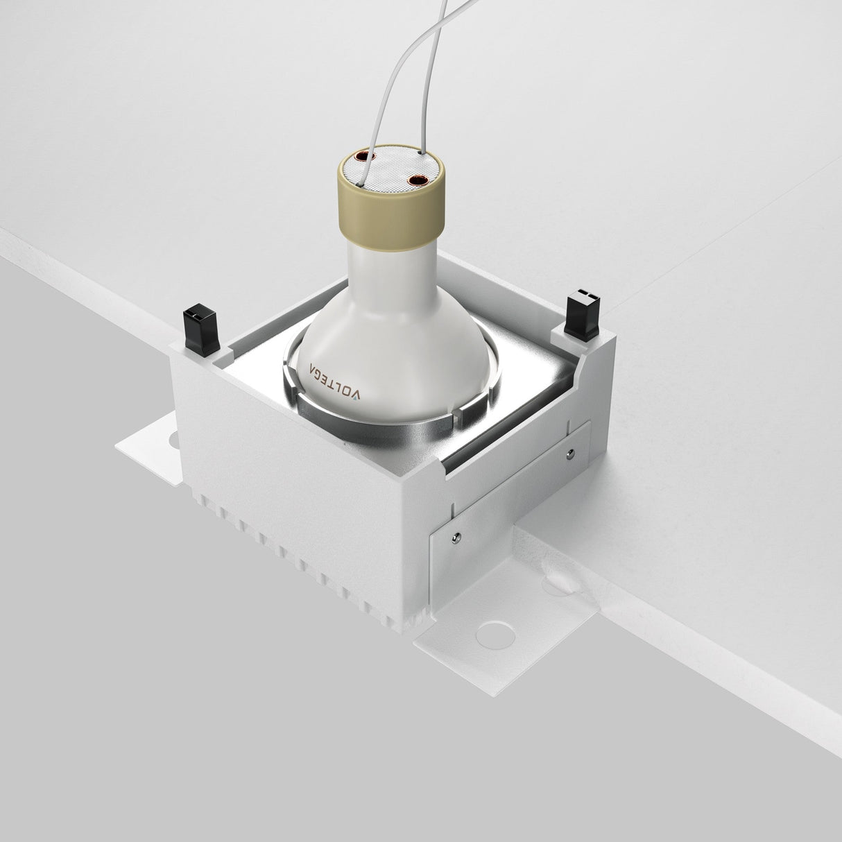 The Share Square Recessed Downlight by Voltega, in matte silver, is perfect for modern interiors. It features a cylindrical socket secured inside a square bracket installed in the ceiling panel.