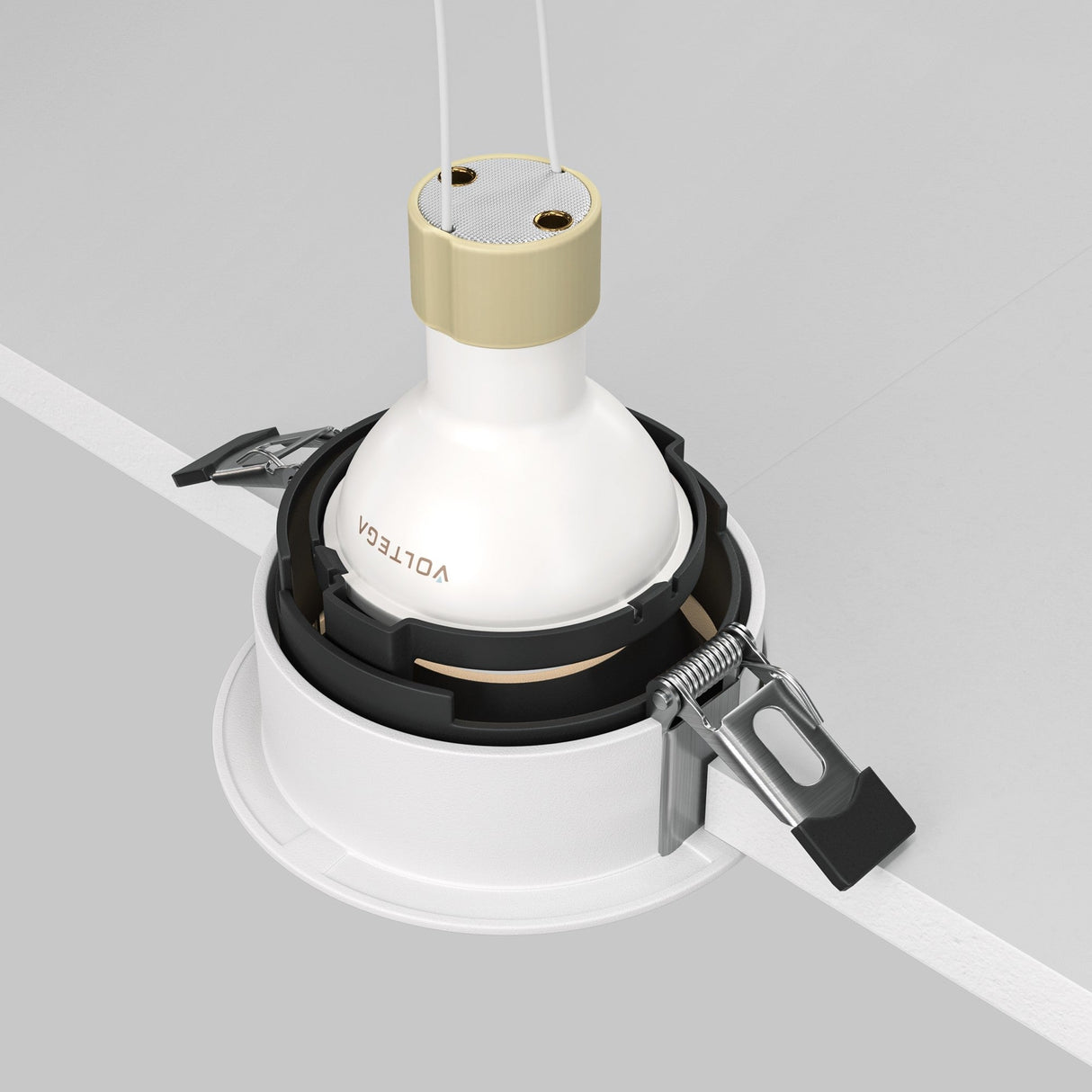 The Share Round Recessed Swivel Downlight in White & Black is perfect for modern interiors. It features a recessed LED with a white cylindrical bulb and mounts seamlessly into the ceiling with visible clips and spring mechanisms.