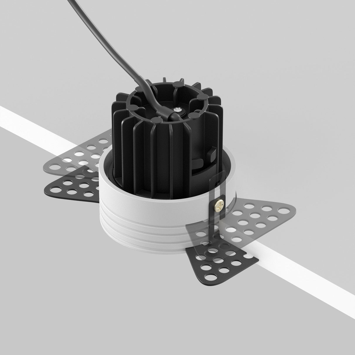 A black Round LED Recessed Trimless Downlight 7W 3000K featuring a cylindrical base and wire is placed on a gray and white surface. Metal brackets with holes suggest suitability for mounting within trimless designs, ideal for recessed downlight applications.