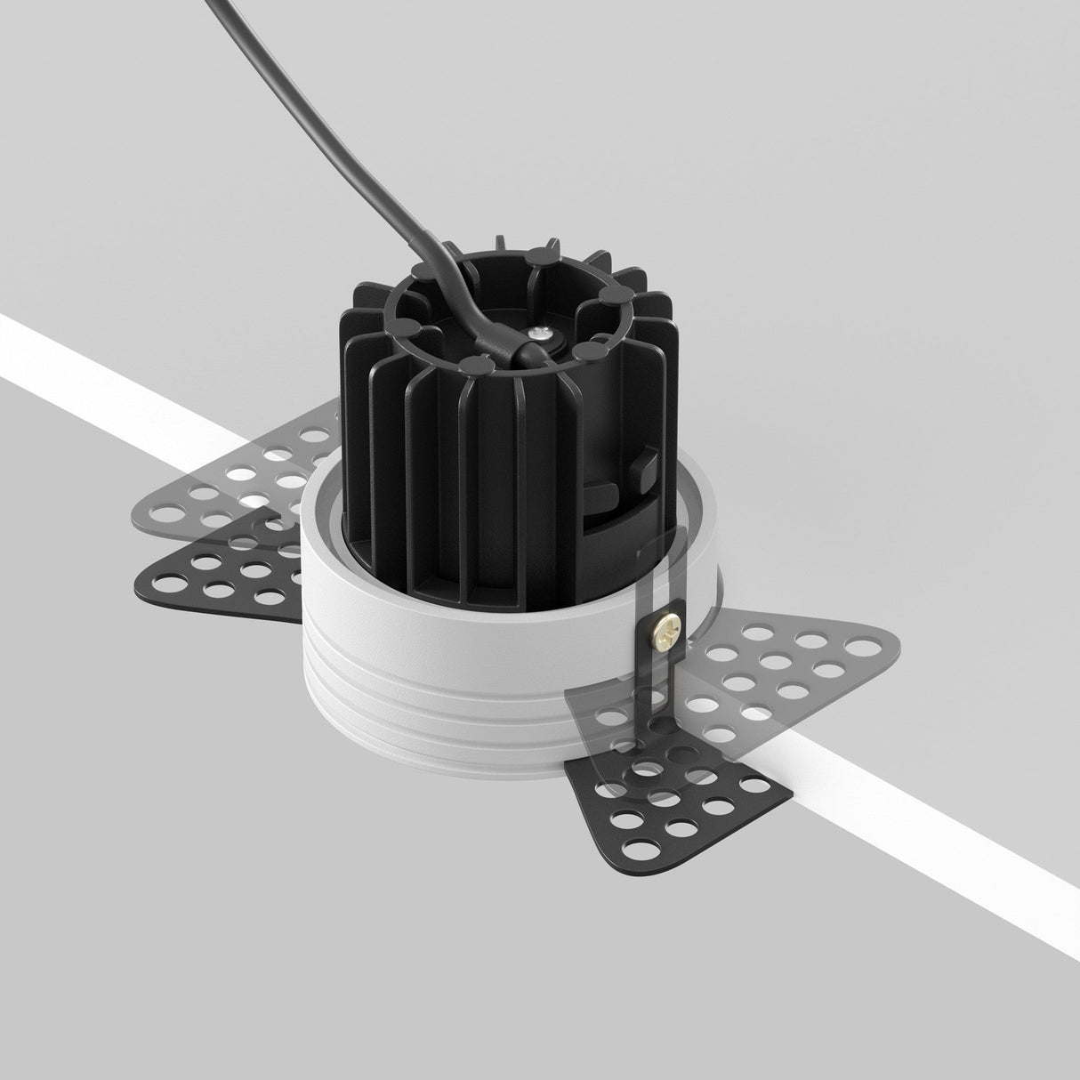 Close-up of the Round LED Recessed Trimless Downlight 7W 3000K in white, featuring a black cylindrical component with a trimless design, mounted on a flat surface. It has black perforated wings and a cable emitting warm 3000K light against a plain gray background.