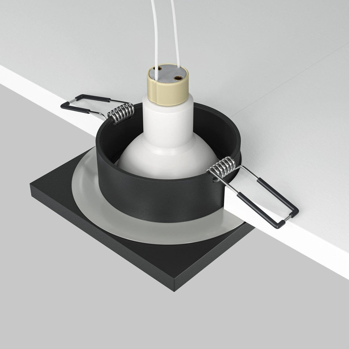 Illustration of the Stark Fixed Square Recessed Downlight - Black, showcasing a square casing with springs, exposed light bulb socket, and upward extending wires. The cutaway view displays its ceiling installation.