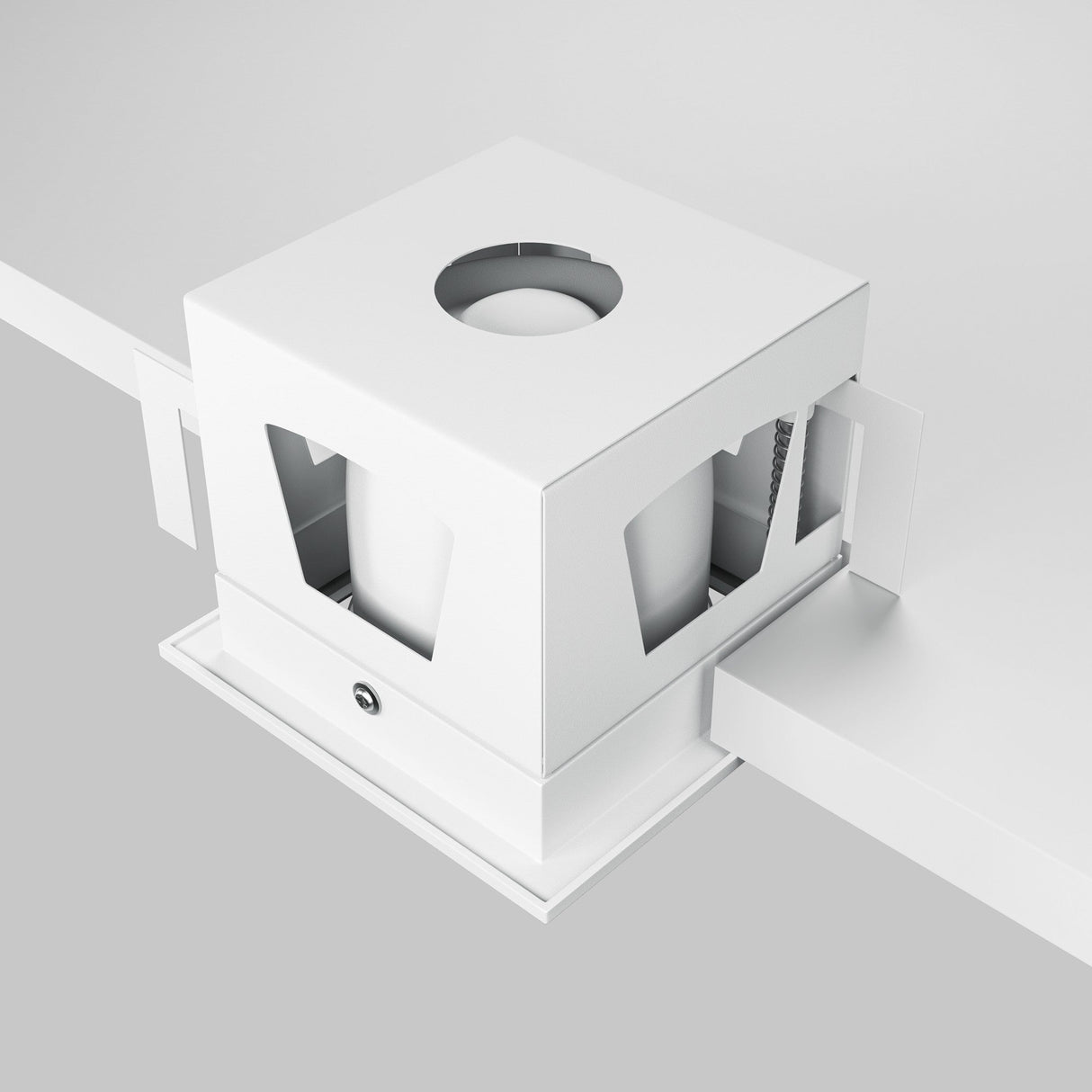 The ceiling features the Metal Modern LED Square Recessed Downlight, 10W 3000K in white. Its boxy design includes a circular top opening and transparent side panels, resembling an industrial fixture commonly used for ventilation or mechanical purposes.
