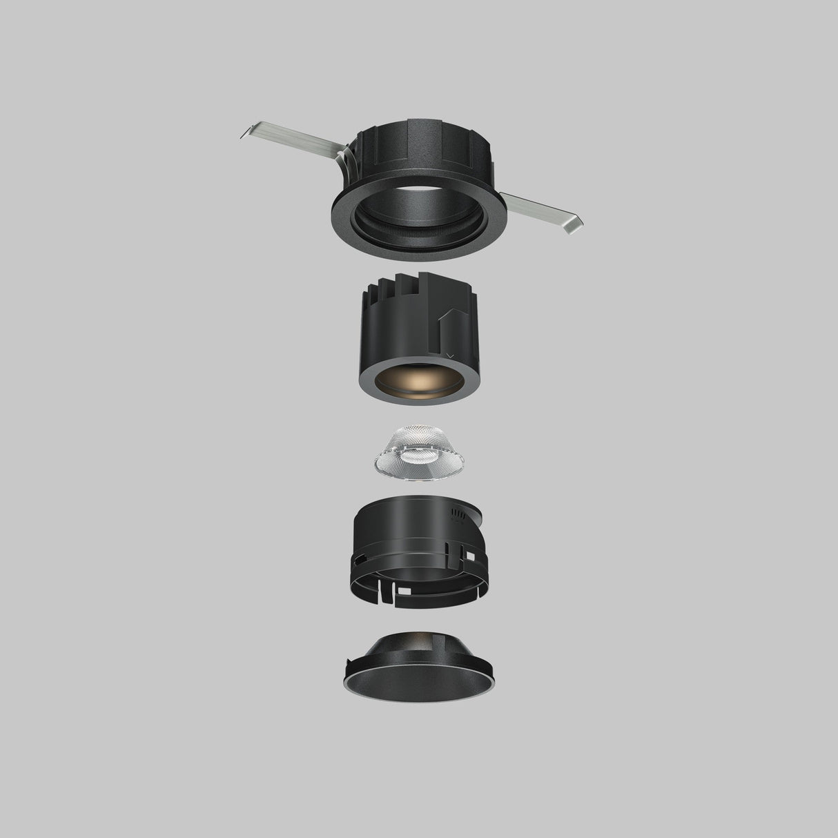 Exploded view of the Wise Downlight Lens - ⌀29mm, 50° featuring ambient lighting, parts like a black casing, cylindrical heat sink, and lens vertically aligned on a gray background for optimal illumination.
