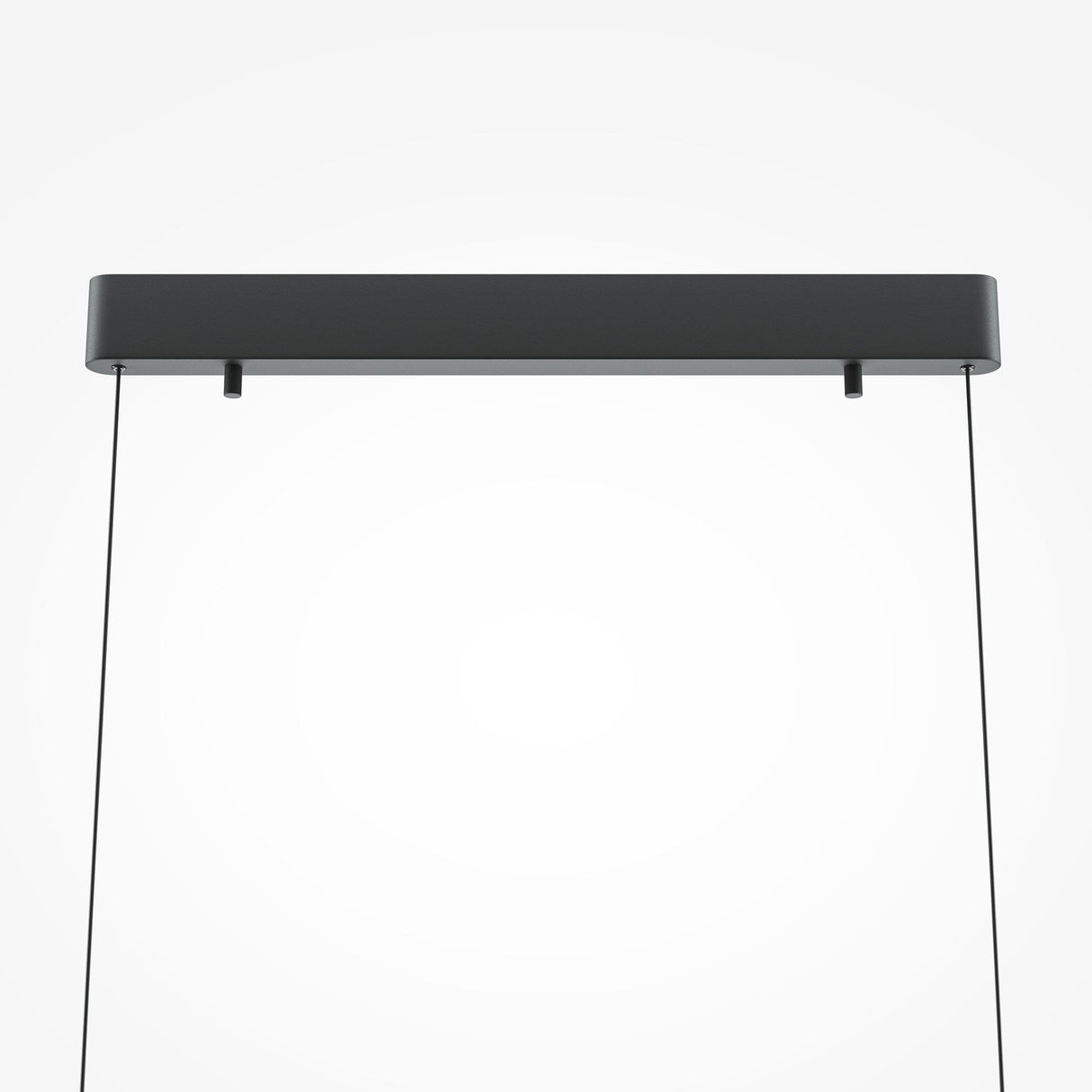 A minimalist black rectangular ceiling fixture, the Motion LED Dimmable Linear Suspension Light, hangs against a plain white background with two thin wires. This modern piece is sleek and elegant, offering energy-efficient illumination.