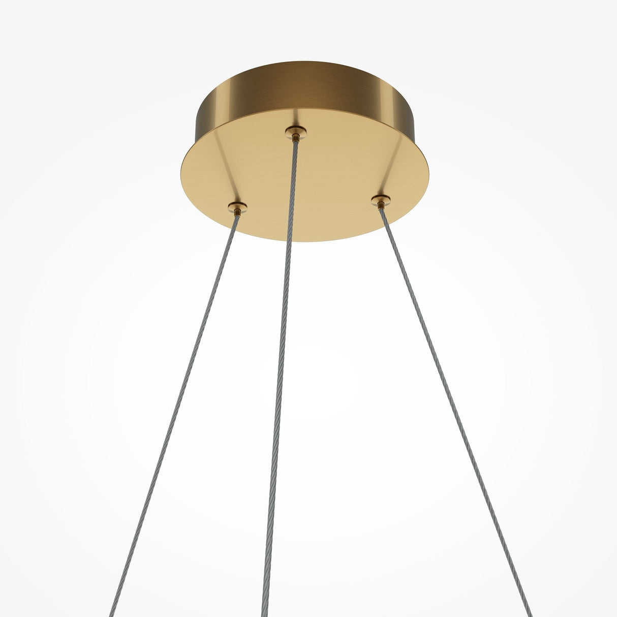 The Breeze LED Circular Suspension Light - Brass boasts a minimalist design with a gold ceiling mount and three slim, angled metal cables. It offers energy-efficient lighting with a sleek brass finish set against a plain white background.