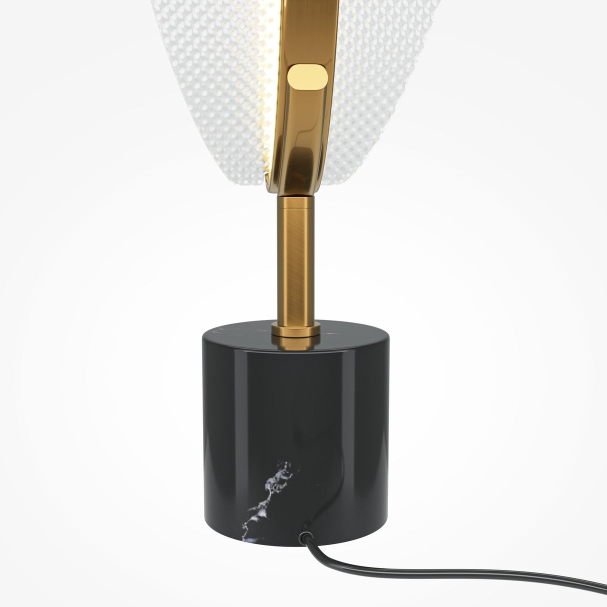 Close-up of the Breeze LED Table Lamp - Brass, showing a black base with a power cord and a slender brass stem. The lamps head has a textured, translucent surface for soft, energy-efficient lighting in a sleek, minimalist design.