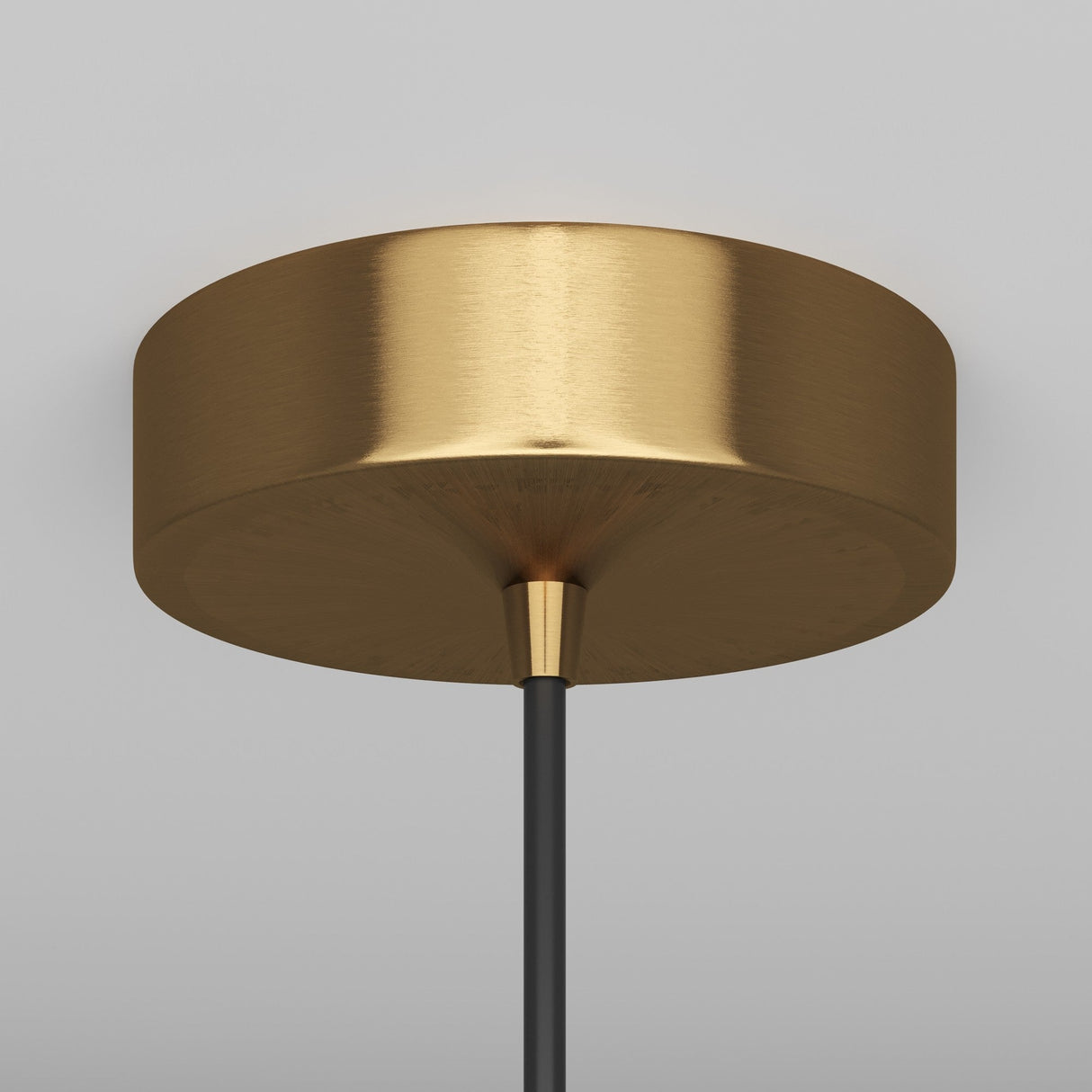 Close-up of the Arrow 1 Light Long Cone Pendant - Gold, showcasing its matte gold finish with a smooth, rounded design. A sleek black rod extends downward like an arrow pendant against a white ceiling.