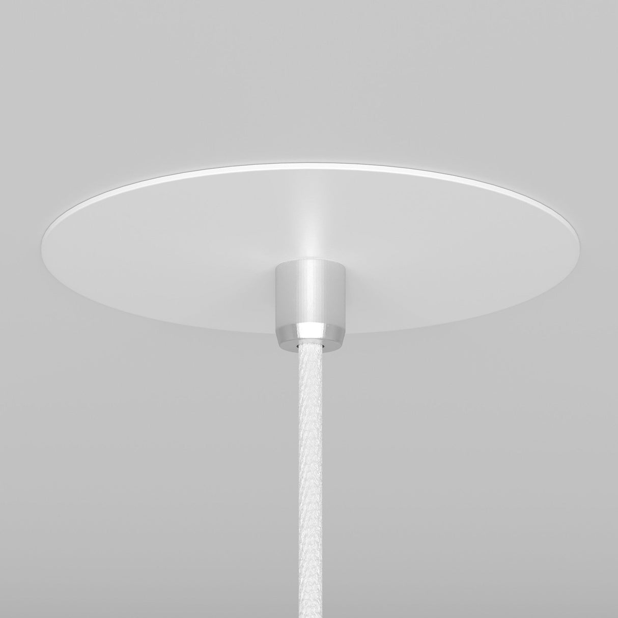 Close-up of the Nevill Conical Pendant Light - White showcases its minimalist design with a round white base and sleek silver attachment. A white cord extends downward from the center against a plain, light gray background.