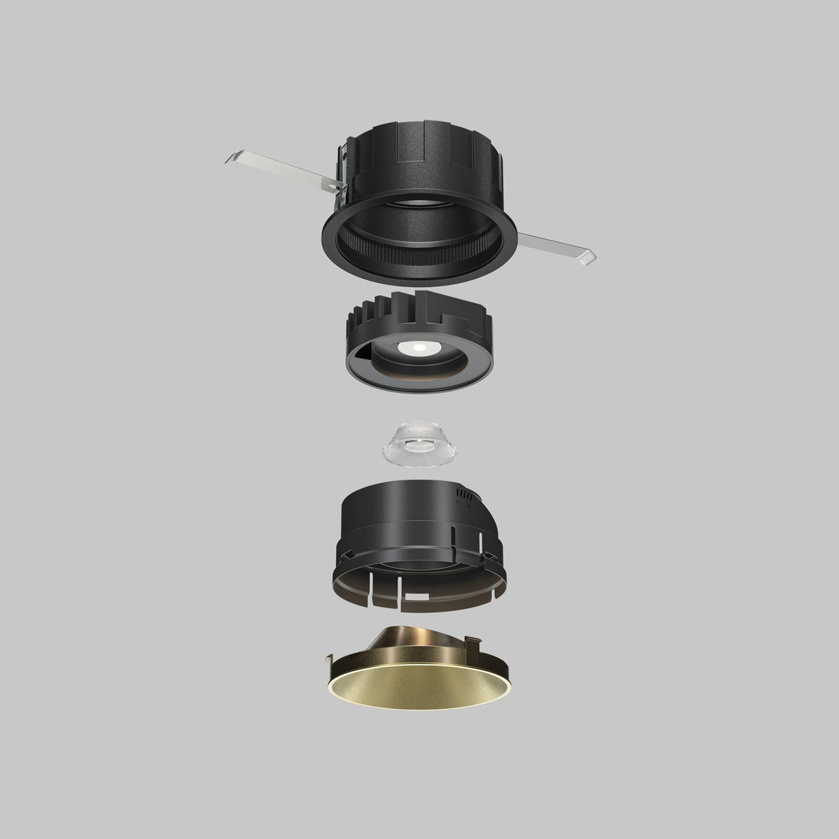 Exploded view of a recessed lighting setup with components, including the outer casing, LED module, lens, and Wise Decorative Reflector Frame 70mm - Matte Gold. Parts align vertically to show assembly order on a gray background.