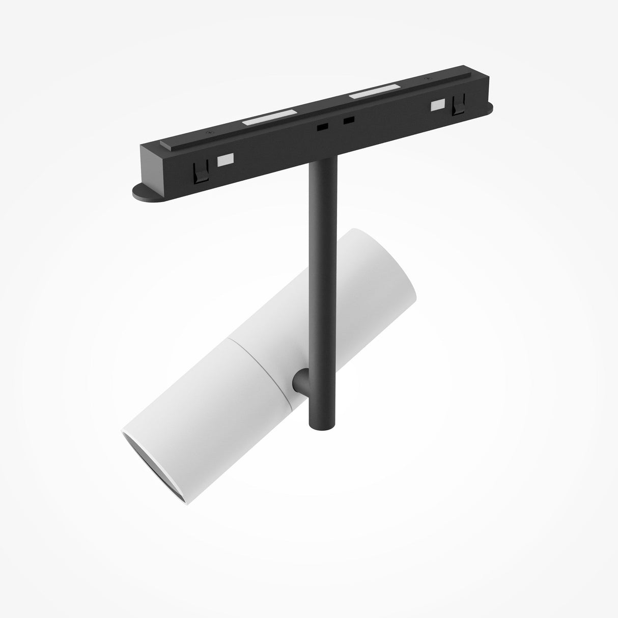 The Elti LED Magnetic Exility Track Spotlight 12W 3000K features a modern, cylindrical design in white with a black mounting bracket. Its attached to a vertical black rod, angled downward, and emits a warm 3000K glow that complements its sleek, minimalist look while allowing customizable lighting.