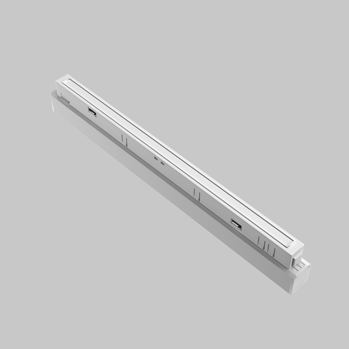 The Points LED Linear Track Light for Magnetic Exility features a modern, white rectangular design with a slim profile, small vent holes on one side, and a USB port. This 18W 3000K light is elegantly displayed against a gray background.
