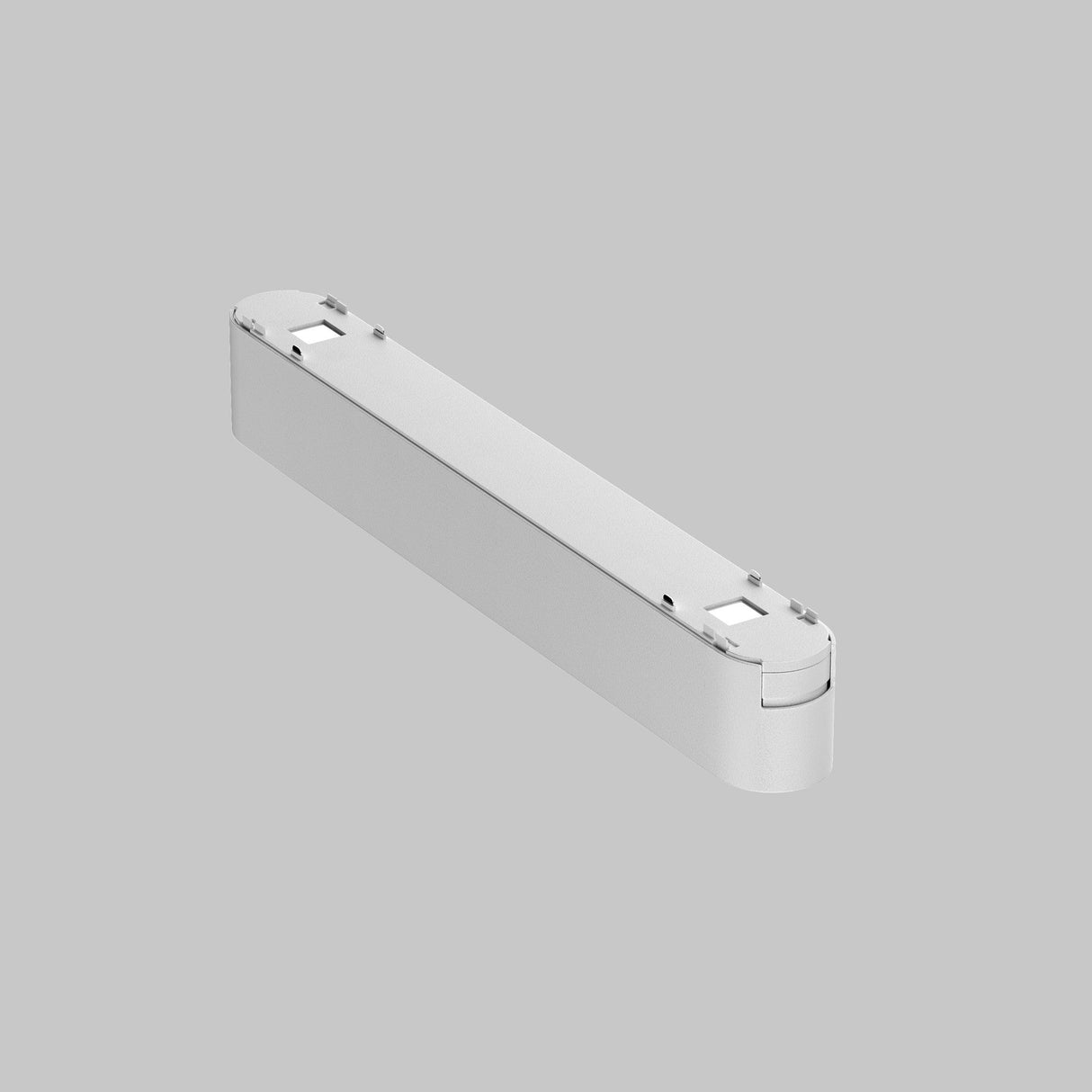 The Basis Grid LED Linear Track Light (Radity 12W, 4000K, White) enhances your space with a rectangular white wall-mounted shelf against a light gray background. Its simple design features rounded edges, a smooth finish, and adjustable lighting for added functionality and elegance.