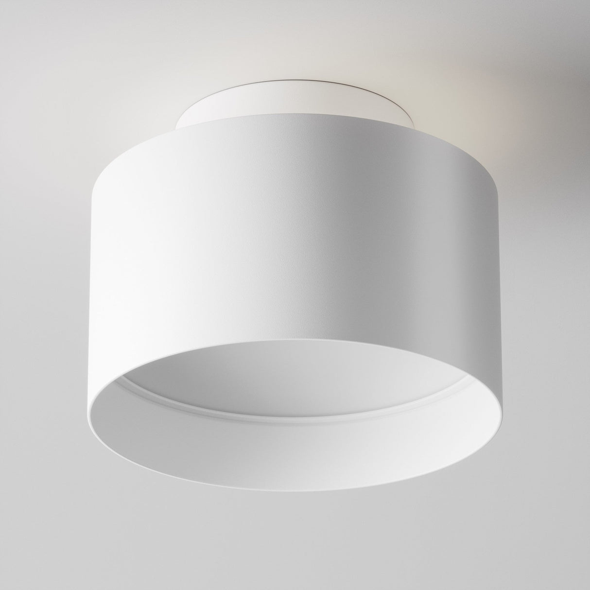 Technical feature of Planet LED Medium Round Surface Downlight in White, illustrating functional design details.