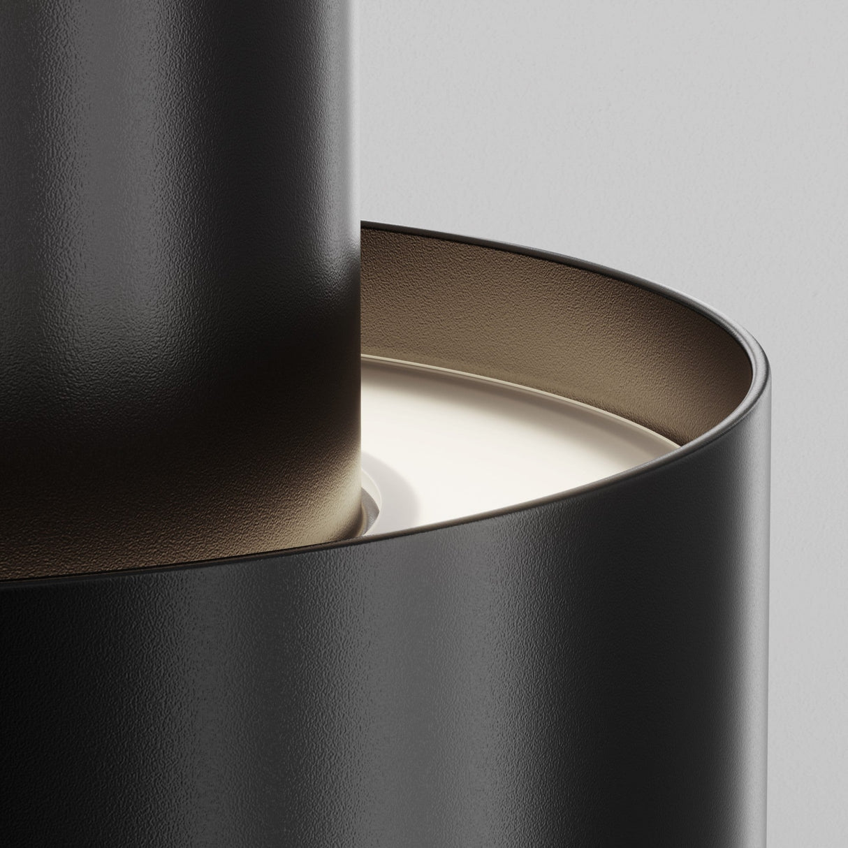 Element detail of Planet LED Small Round Surface Downlight in Black, demonstrating its sleek and minimalistic design.