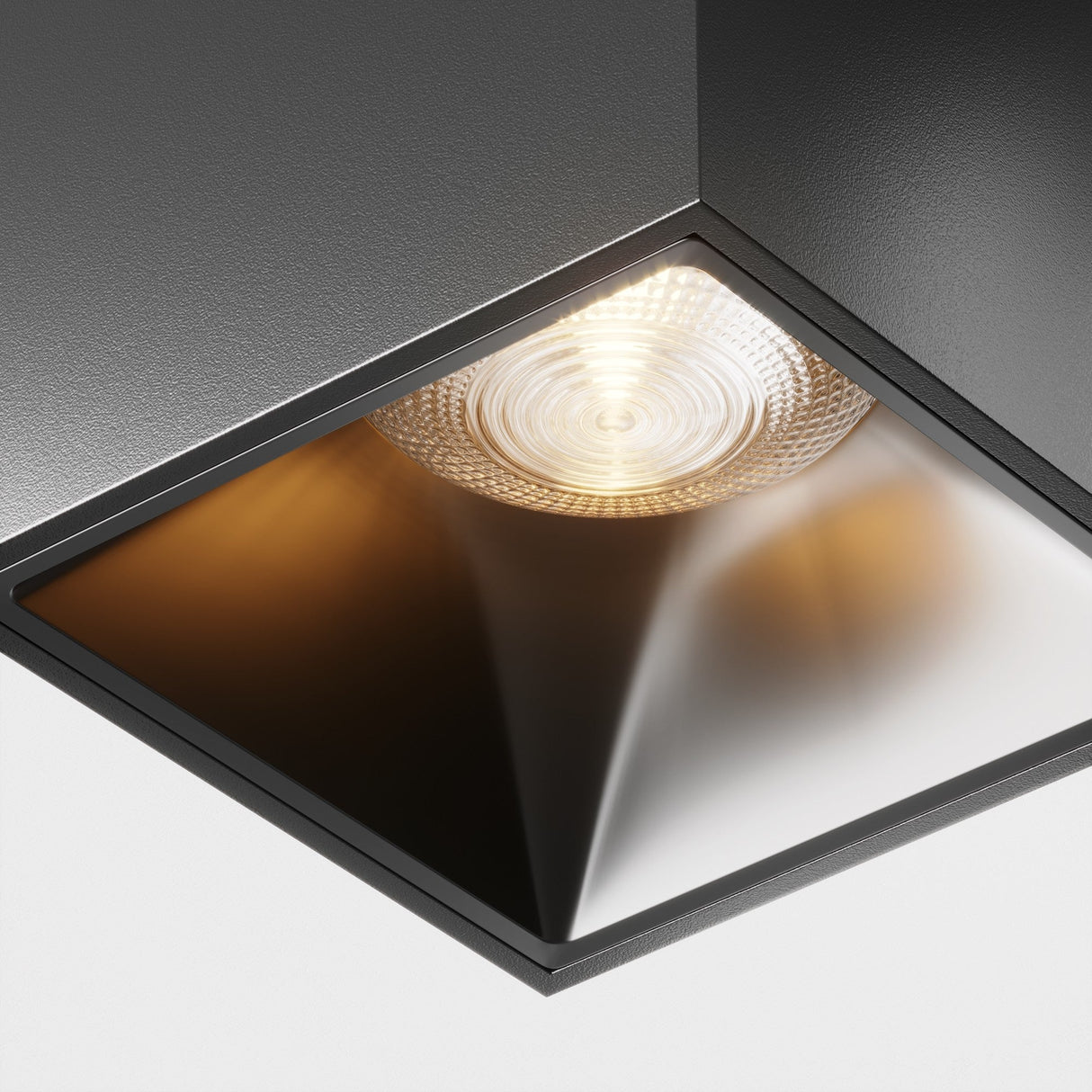 Close-up of Alfa LED Square Surface Downlight in black, showcasing its clean lines and high-quality build