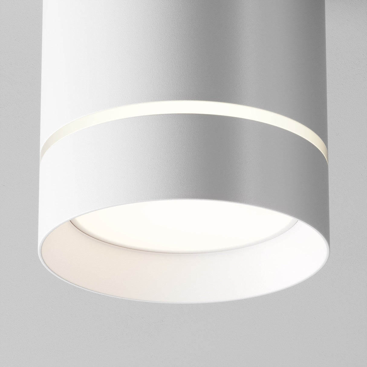 Element detail of Orlo LED Round Surface Downlight in White, designed for clean and unobtrusive ambient lighting.