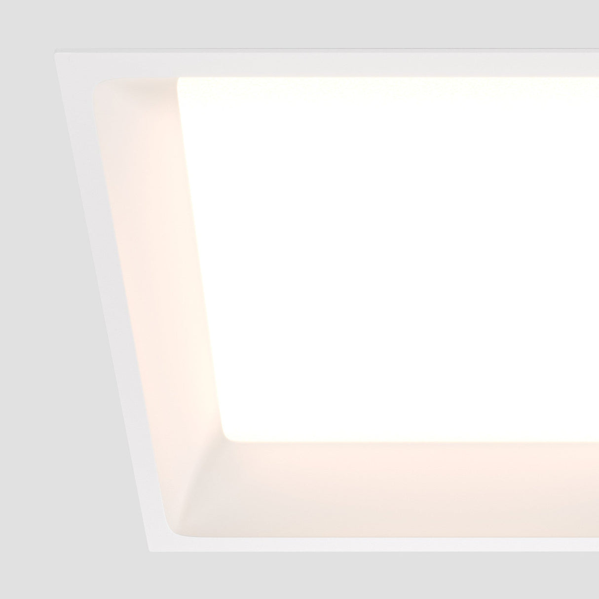 Element detail of Okno LED Square Recessed Downlight in White, highlighting a smooth finish for seamless integration in ceilings.
