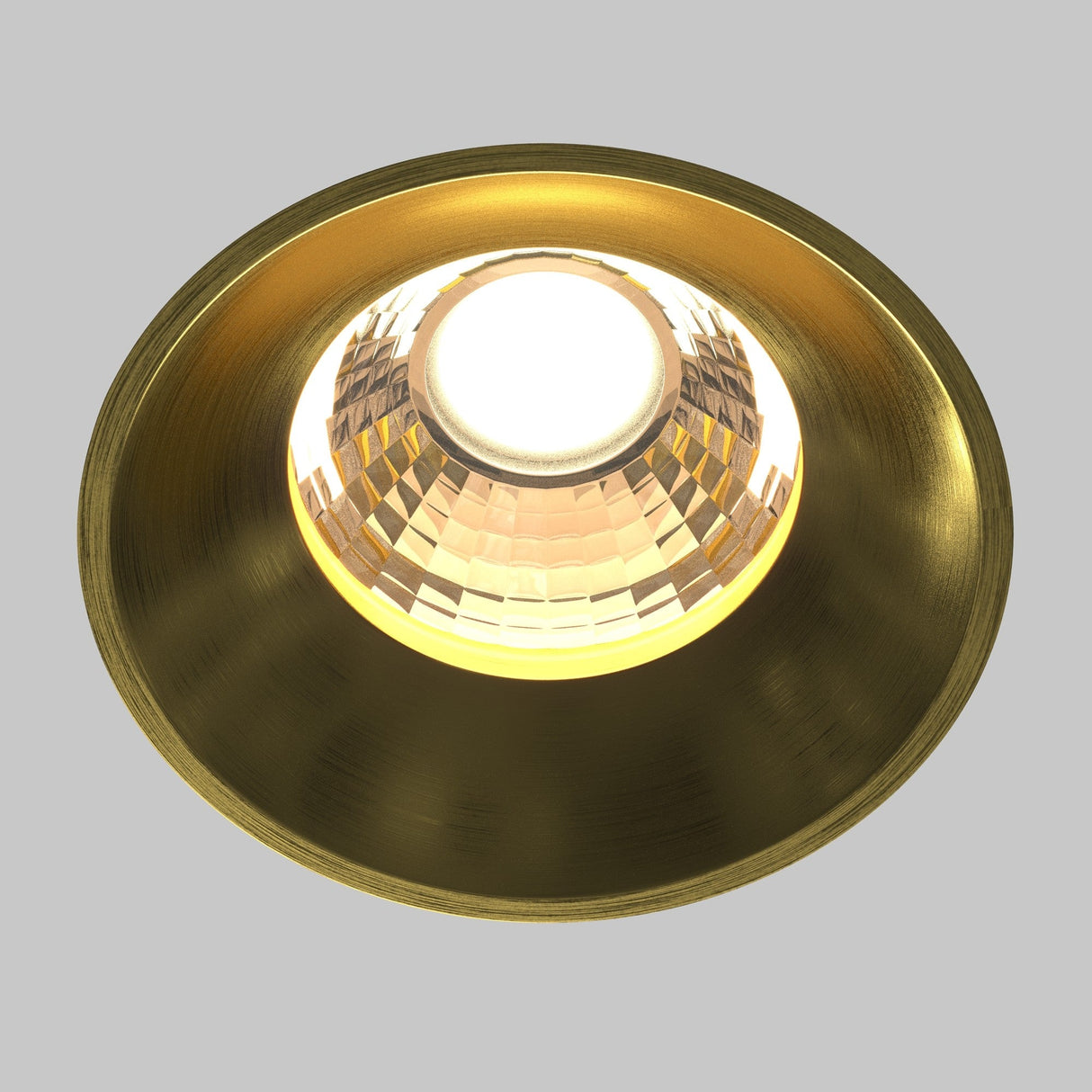 Close-up of round LED recessed trimless downlight in brass, featuring a refined, polished look for elegant decor.
