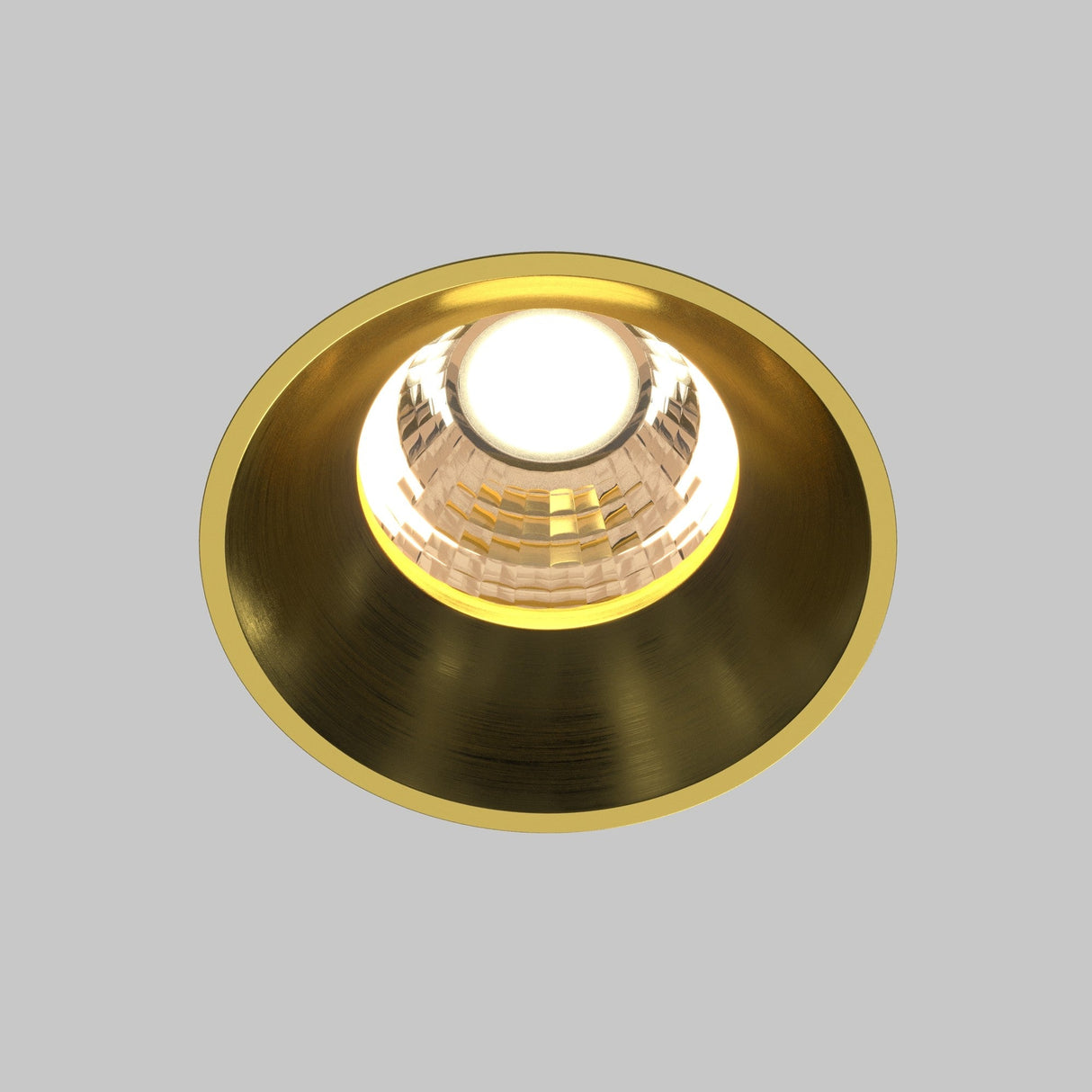 Close-up of round LED recessed trimless downlight in brass, showcasing its sophisticated finish.