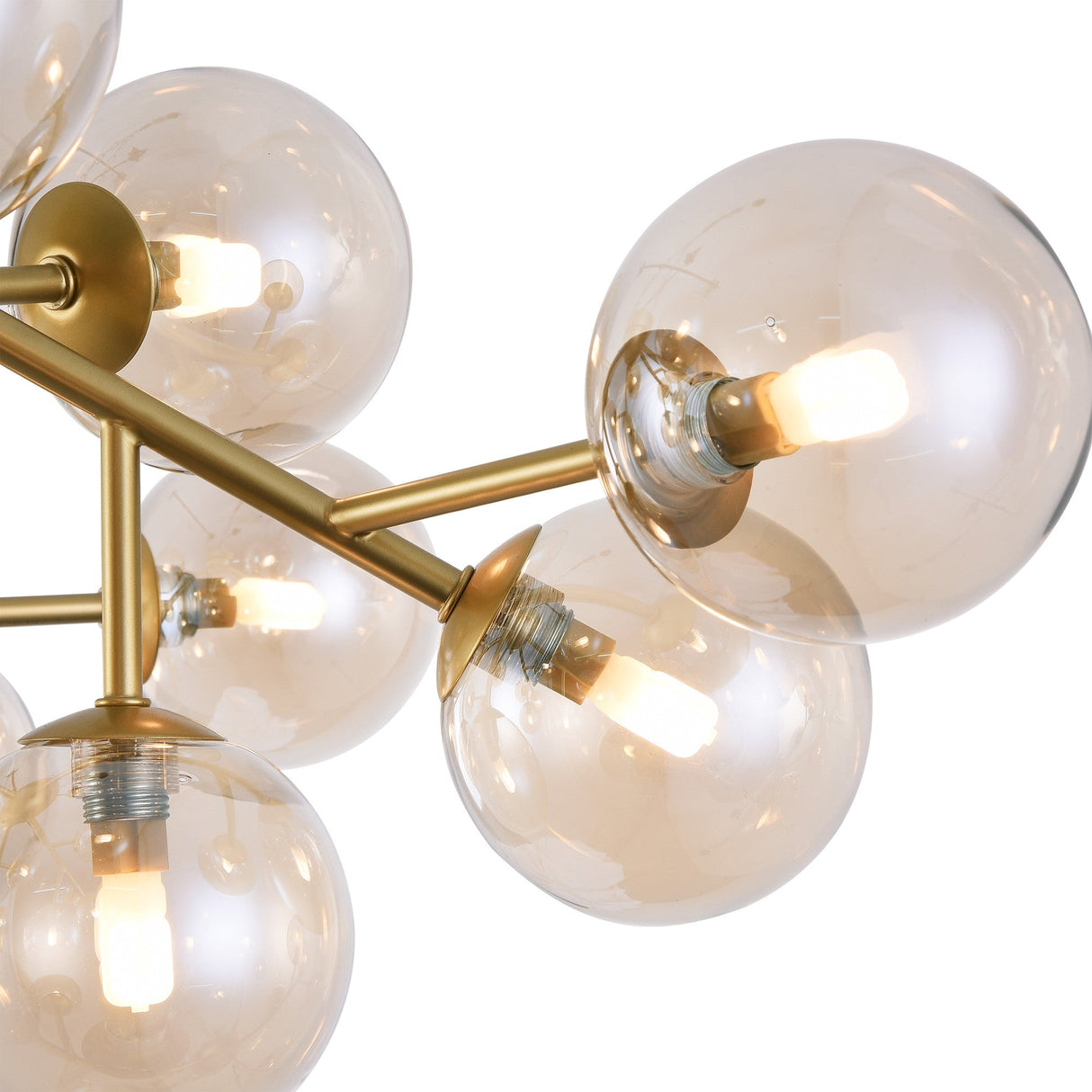 Close-up of the Dallas 20 Light Semi-Flush, featuring a modern design with amber glass bulbs and a gold metal frame. The bulbs emit a warm white glow, showcasing a sleek and contemporary look.