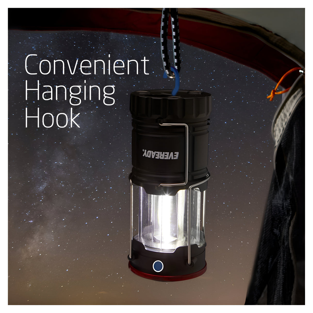 An Eveready 2 in 1 Hybrid Powered Lantern, glowing with its 300 Lumen brightness, hangs inside a tent at night. The convenient hanging hook showcases its rechargeable collapsible design, complemented by the text highlighting its USB and Battery Charging capability against a backdrop of a starry sky.