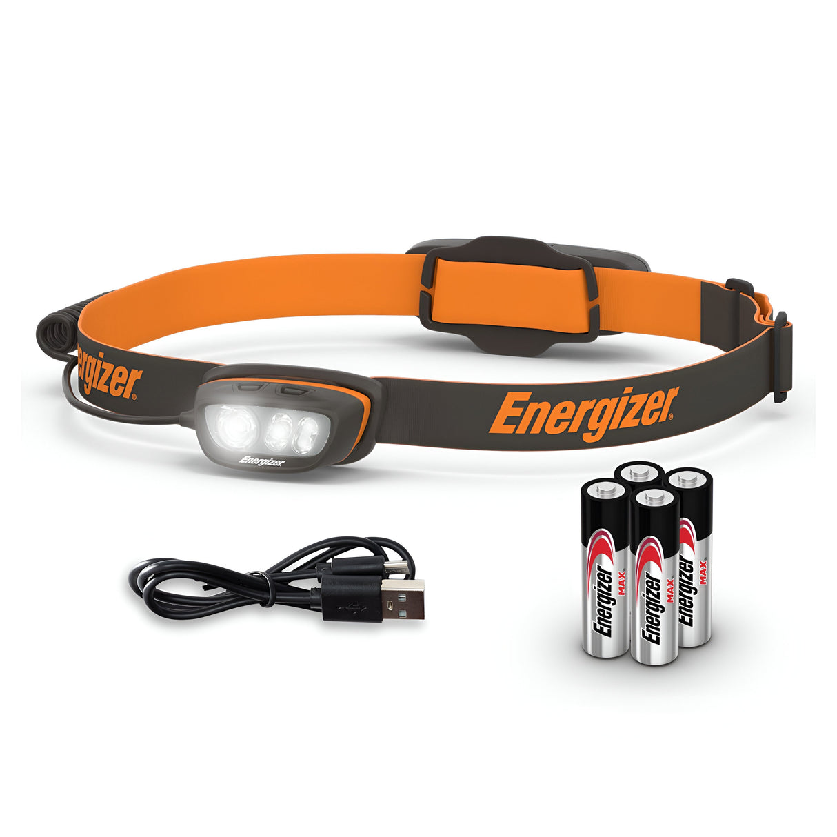 The Energizer Rechargeable LED Head Torch 750 Lumens - Batteries Included features a black and orange design with a pivoting head and an adjustable strap. It includes a USB charging cable and four AA batteries for its hybrid power system.