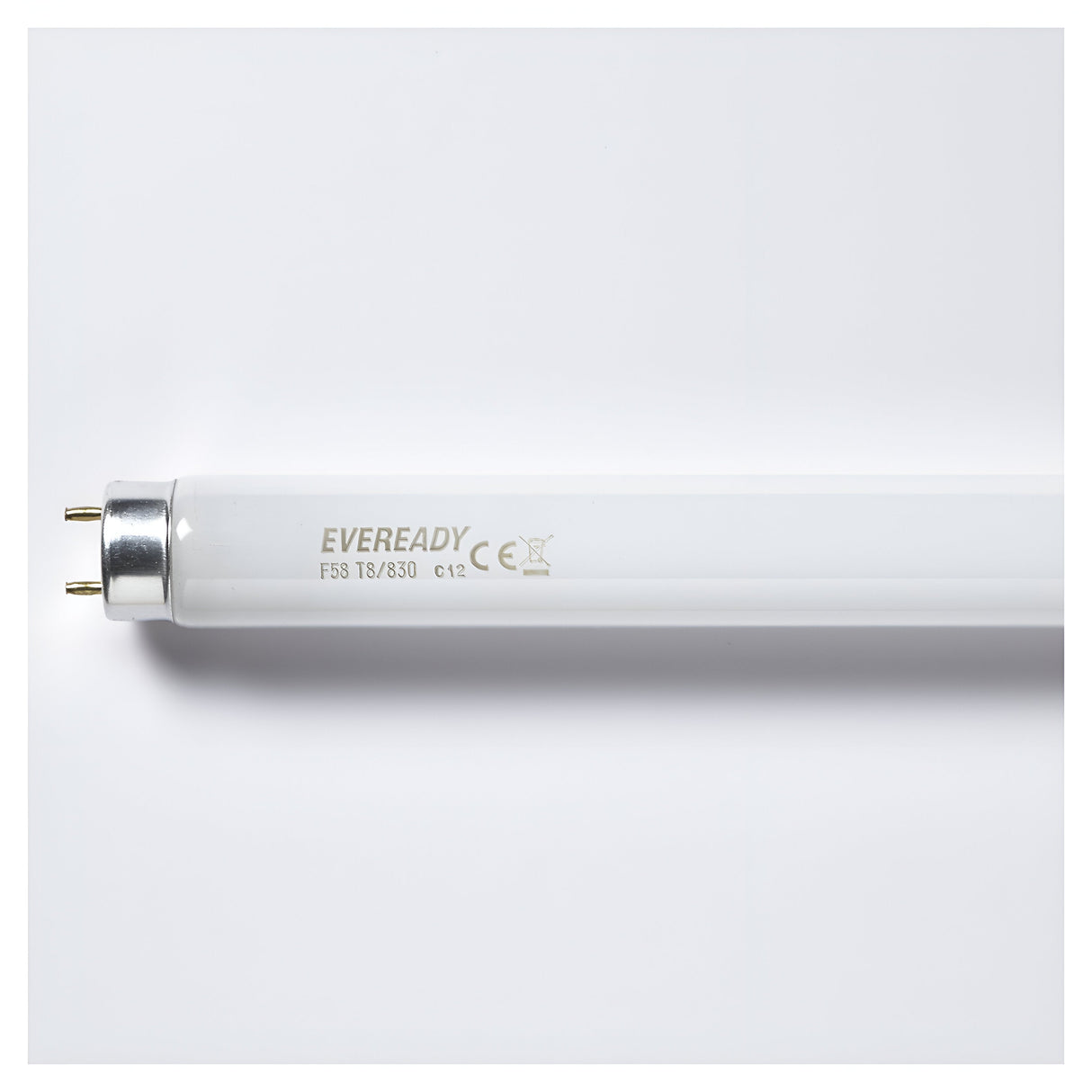 The image captures a detailed view of the end cap with two pins for connection on an Eveready 58W T8 5ft Fluorescent Triphosphoric Tube - 3000K. The label displays "EVEREADY F58 T8/830" along with CE and recycling symbols, set against a plain white background.
