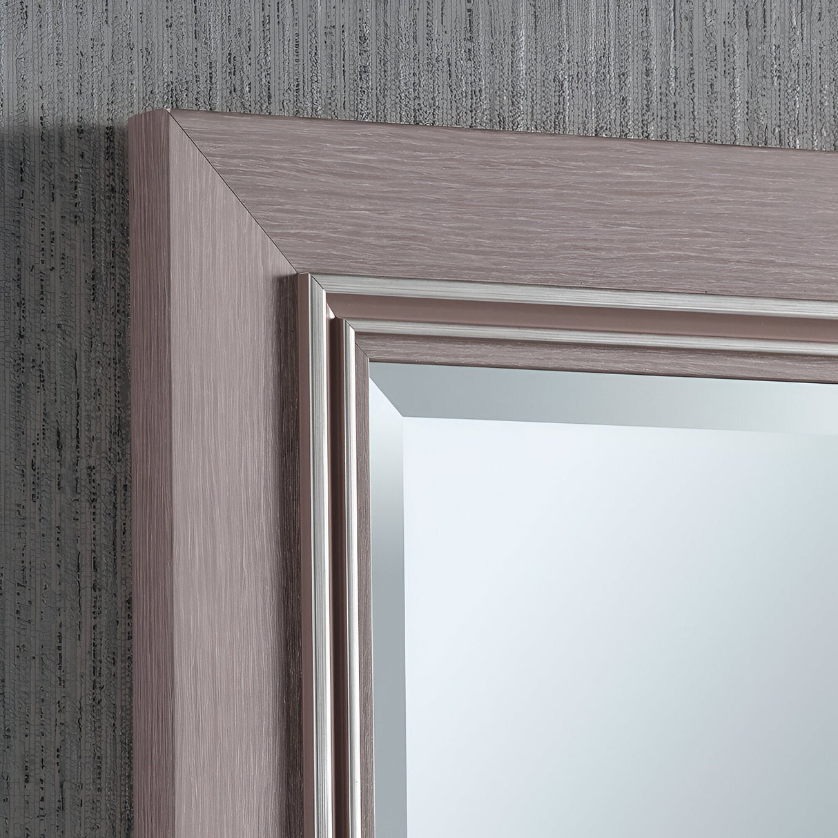Close-up of the Alaris Rectangle Wall Mirror - Grey, showcasing its elegant grey wood frame. The layered, textured finish amplifies its minimalist style, adding depth and character to the mirror's look. The background wall features a subtle texture that enhances the mirror's sophisticated presence.