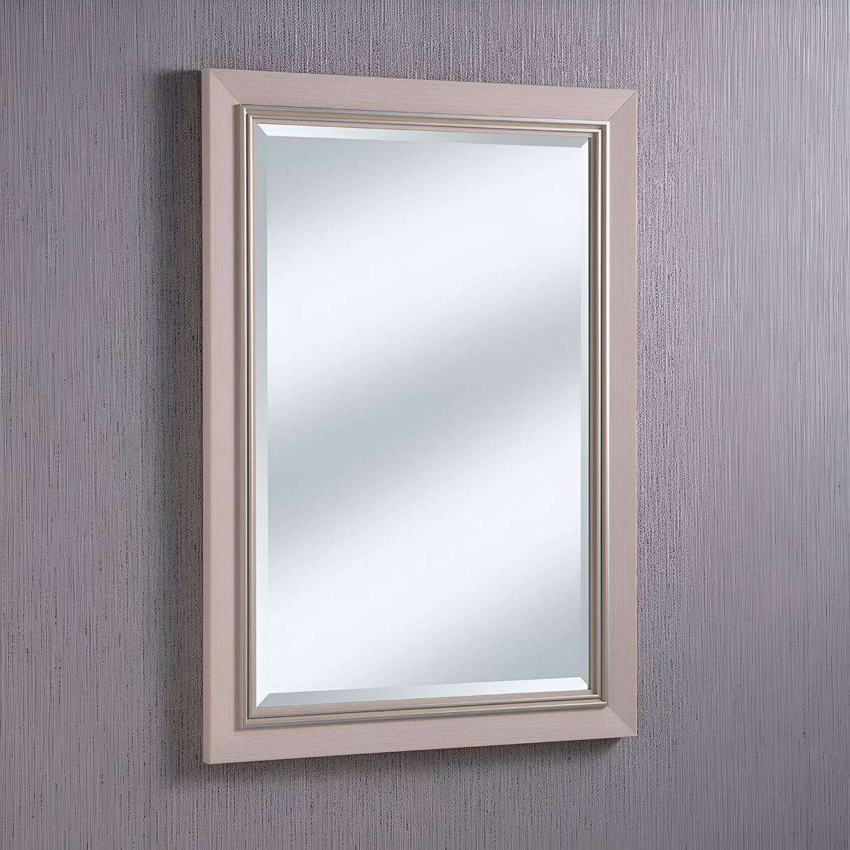 A beige, textured frame surrounds the chic Alaris Rectangle Wall Mirror - White on a light gray wall with subtle vertical patterns. This minimalist modern accent reflects soft, diffused light, enhancing the serene ambiance of contemporary interiors.