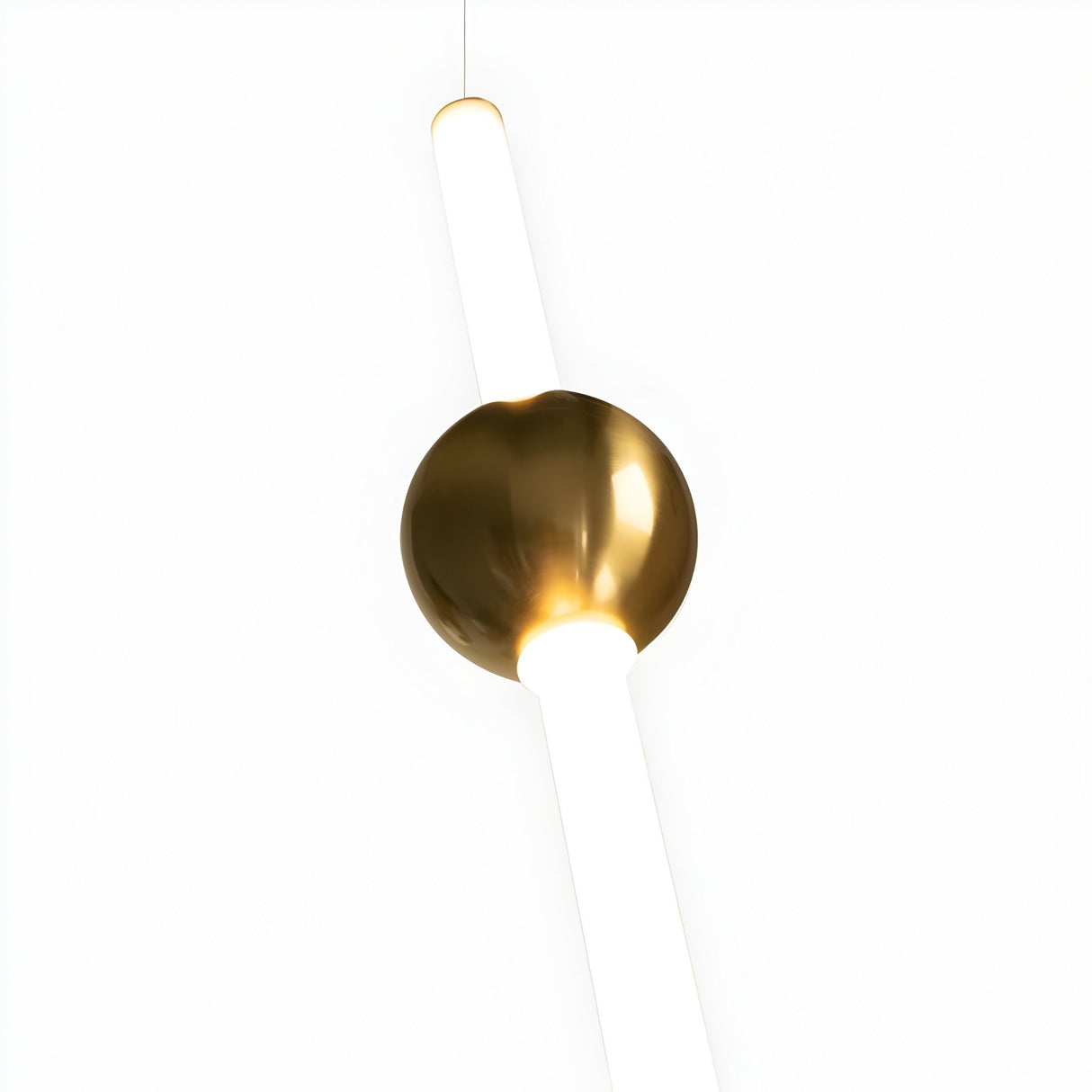 The Sottile LED Vertical Suspension Light - Gold showcases a glowing white vertical tube through a polished gold sphere, creating a striking minimalist look against a plain white background.