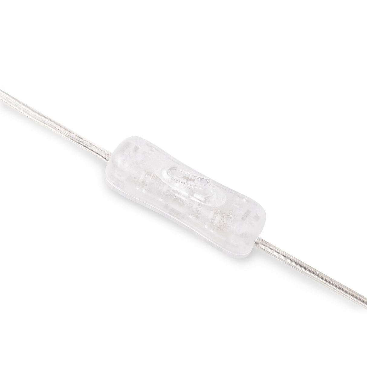 A close-up of a transparent inline switch on a thin electrical wire, ideal for controlling ambient lighting. The rectangular switch features a central toggle in clear plastic housing, perfect for use with your Memory Table Lamp - White or any opal glass diffuser setup.