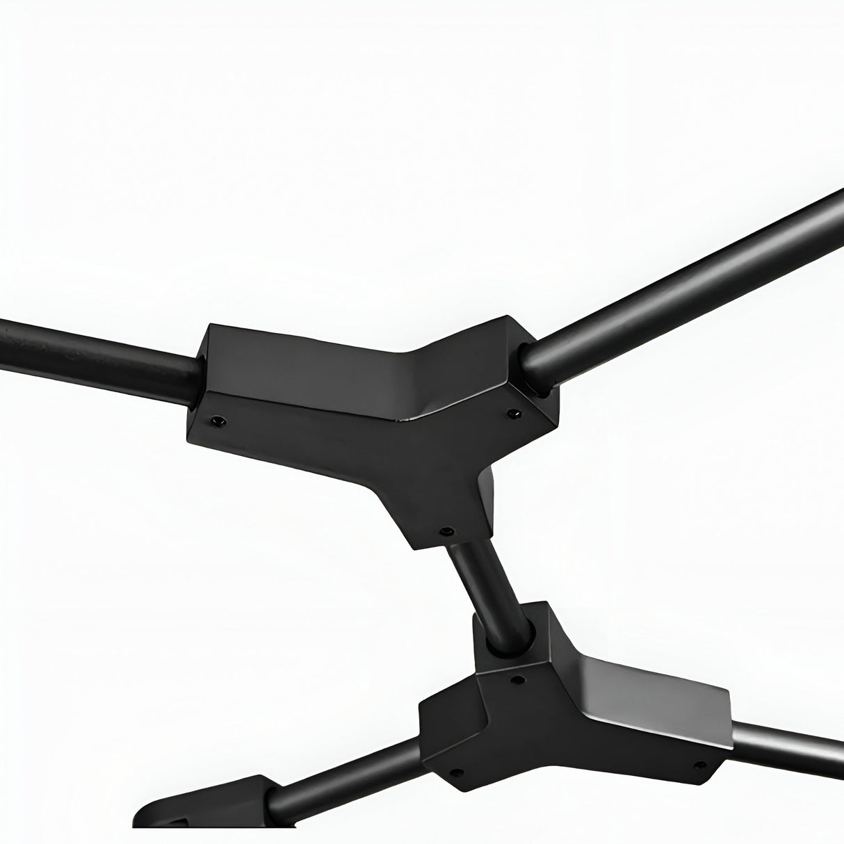 Close-up of Niori Tree 7 Light Suspension in black, showing angled metal arms meeting at two geometric joints against a white background.
