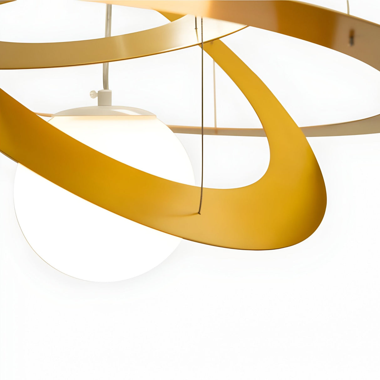 The Universe LED Suspension Light - Matte Gold showcases a spherical white lamp surrounded by overlapping matte gold rings, ideal for enhancing modern interiors. Displayed on a plain white background.