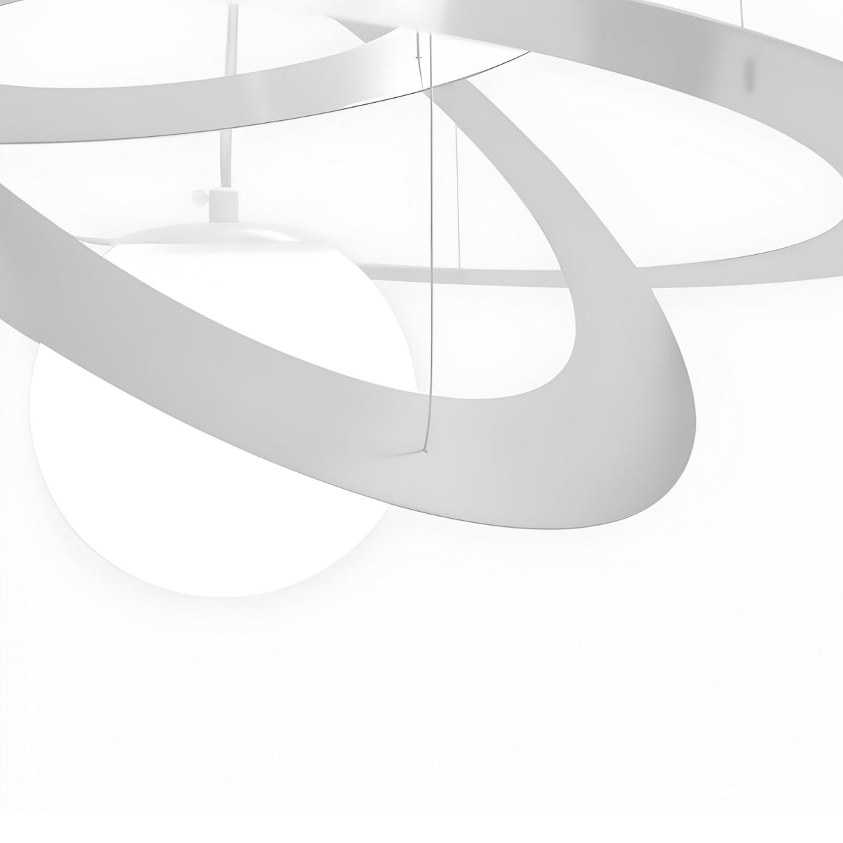 Minimalist abstract image with overlapping white curves and a glowing sphere, evoking planetary orbits on a matte white background, inspired by the modern and futuristic style of the Universe LED Suspension Light - Matte White.