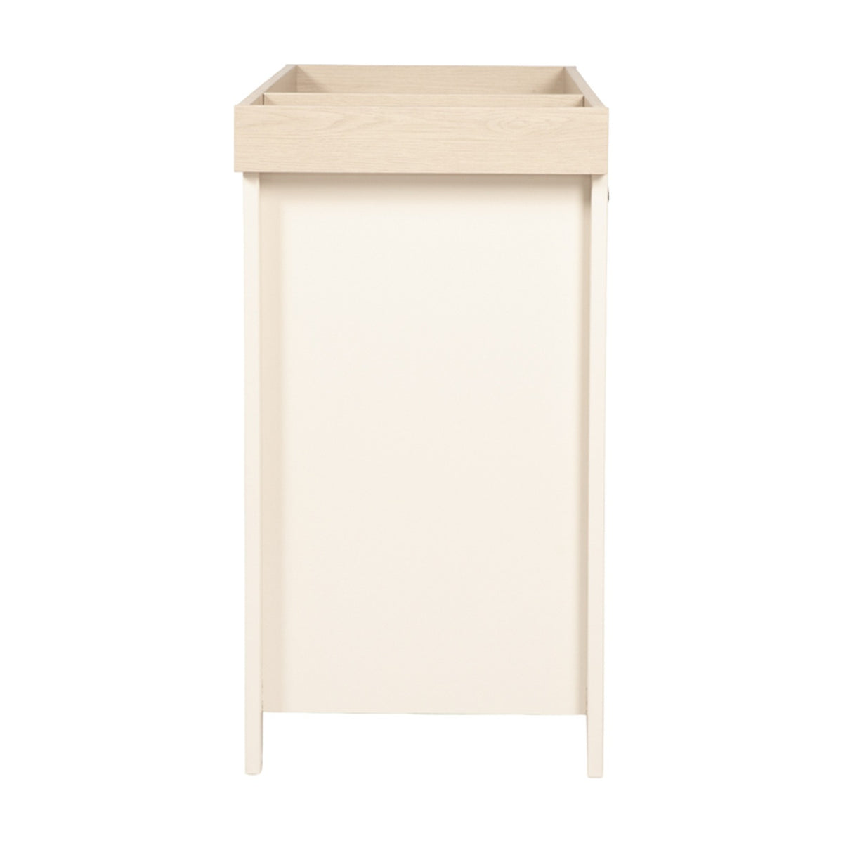 Wanderer Changing Table with Drawers & Removable Top in cashmere, side view showing tall tapered legs, oak-effect tray top, and flat cream panel side, on a plain white background.