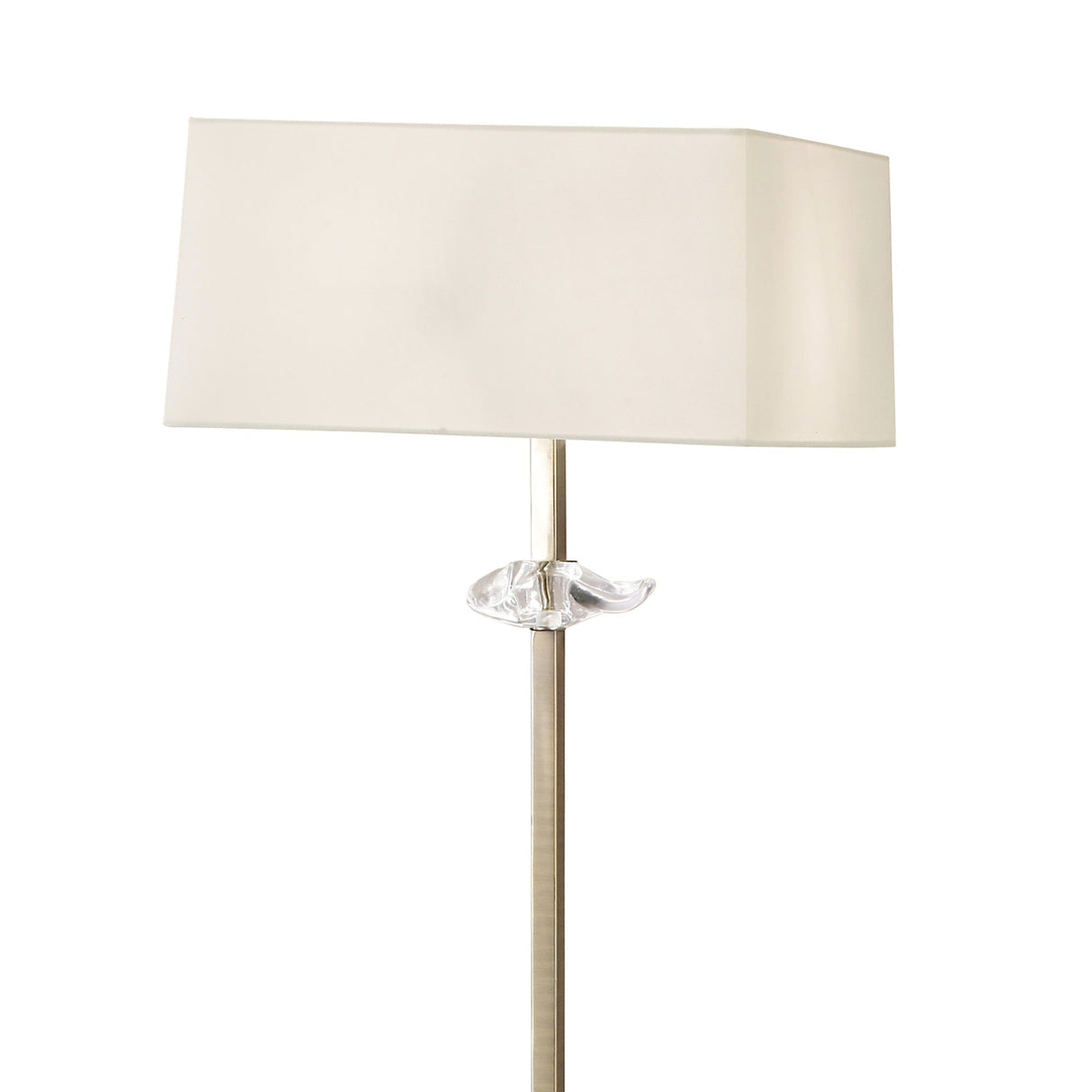 The Akira 3 Light Floor Lamp features an antique brass stand, decorative clear glass detail, and a rectangular cream shade for elegant ambient lighting.