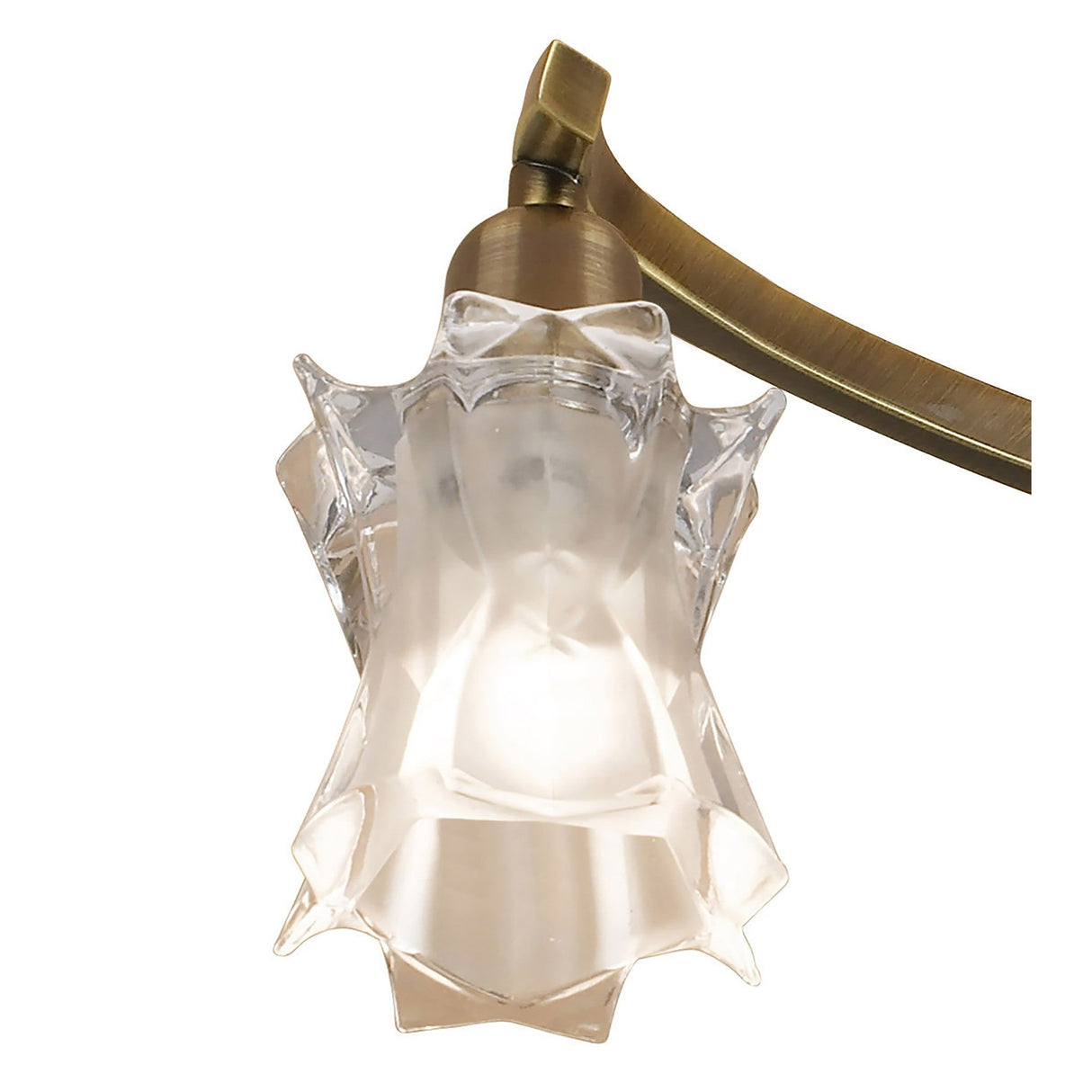 Close-up of one frosted and clear sculpted star-shaped glass shade on the Mantra Alaska semi-flush ceiling light, with curved antique brass arm.