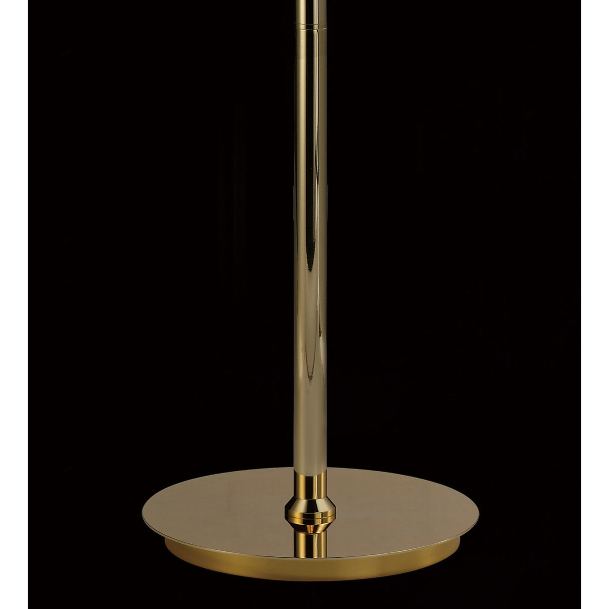 A close-up of the lower part of the Alexandra 6 Light Crystal Floor Lamp in polished gold, featuring a round, flat base, set against a solid black background.