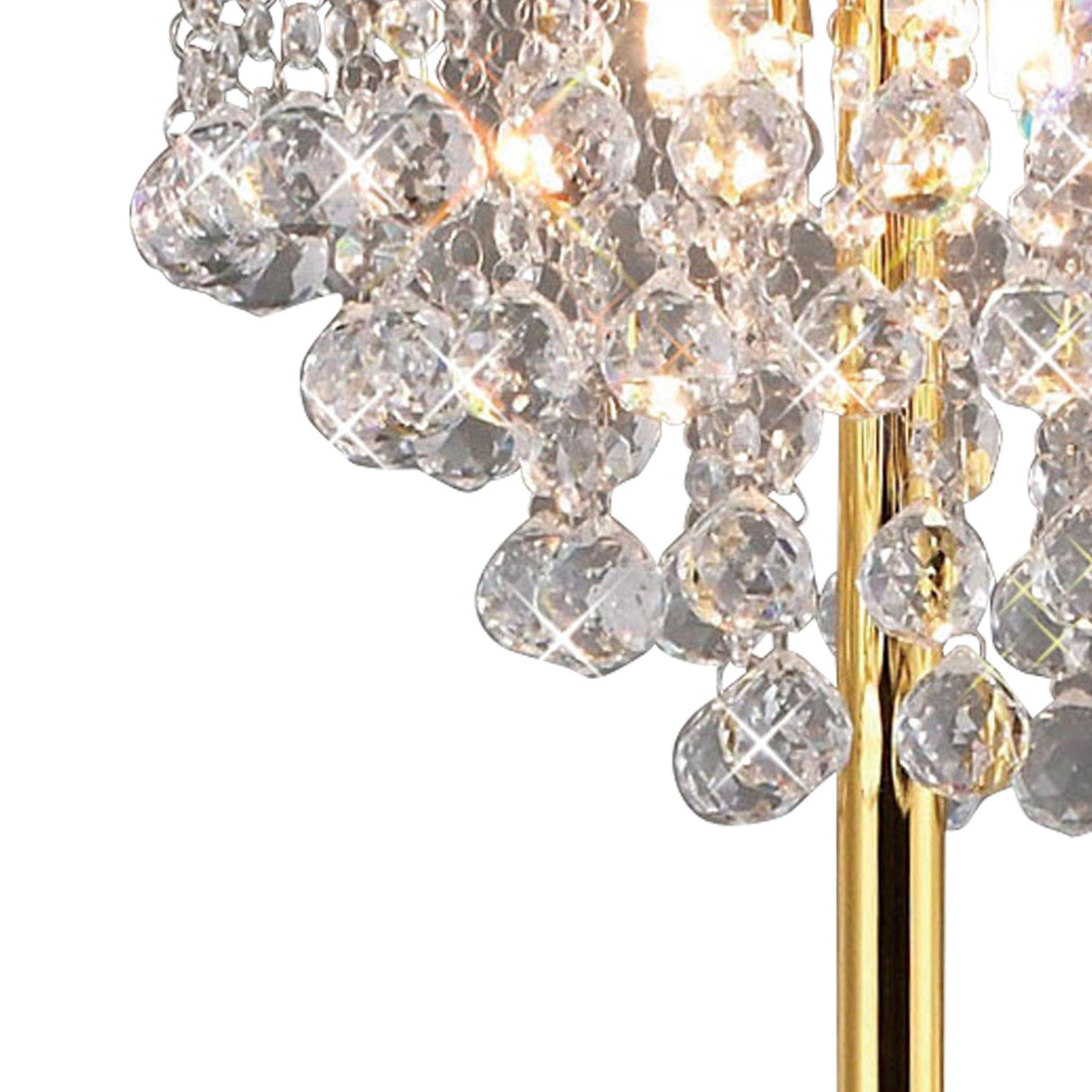 A close-up of the Atla 4 Light Crystal Floor Lamp in French Gold, featuring clear faceted crystals and a gleaming gold frame that reflects light, adding luxurious elegance to any sophisticated space.