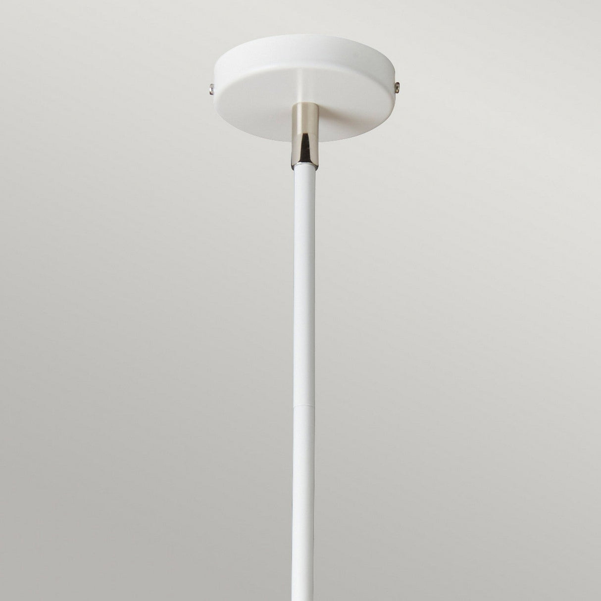 Close-up view of the Balance 5 Light Chandelier - White/Polished Nickel, highlighting a ceiling rod fixture with a metallic accent against a plain gray background. The modern design elegantly blends style with energy-efficient lighting.