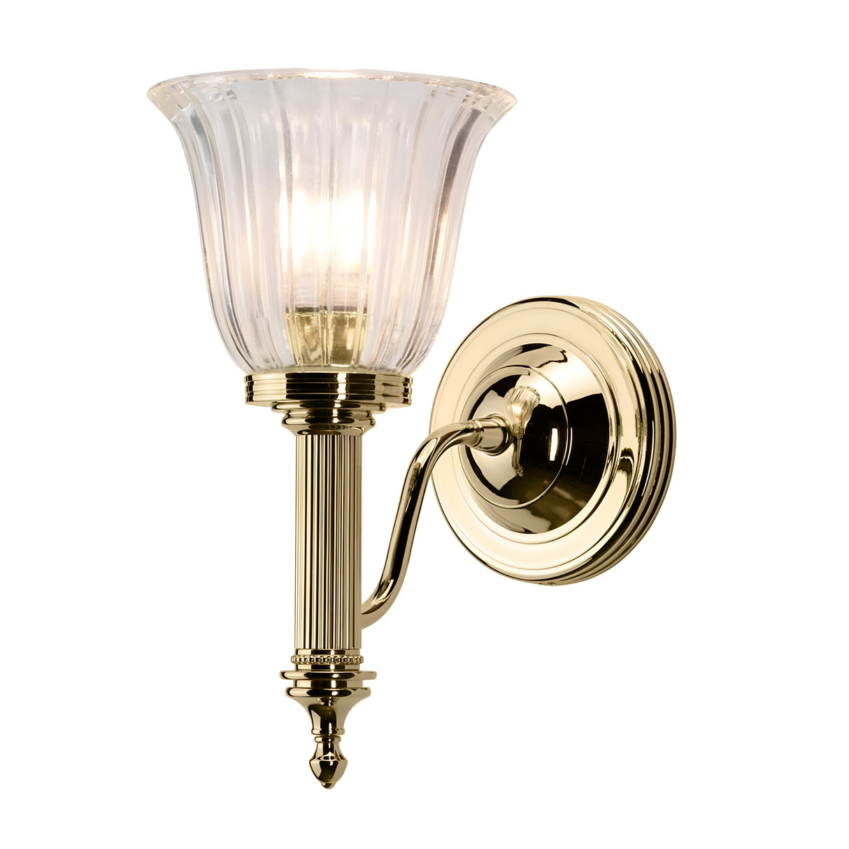Inspired by vintage design, the Carroll Wall Light in polished brass features a ribbed, flared glass shade with ornate detailing, making it perfect for bathroom vanity lighting while casting a gentle glow.