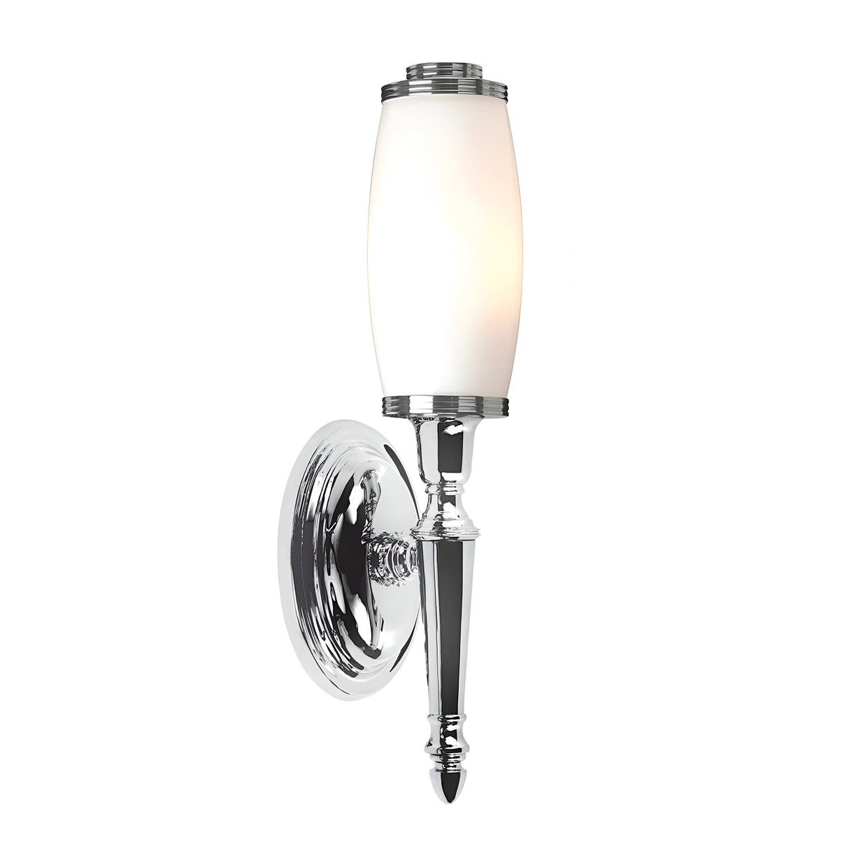 The Dryden-4 Wall Light in polished chrome boasts a sleek design with an elongated, frosted glass shade mounted on a round base. This modern fixture is complemented by an energy-efficient LED lamp that emits a soft white glow, adding a touch of elegance.