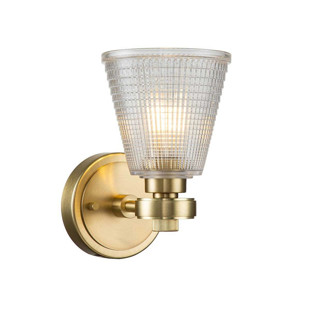 The Gunnislake 1 Light Wall Light boasts a brushed brass base and a prismatic, cone-shaped glass shade. When illuminated, the light bulb casts a warm glow. This Elstead lighting fixture seamlessly combines modern and classic design elements.