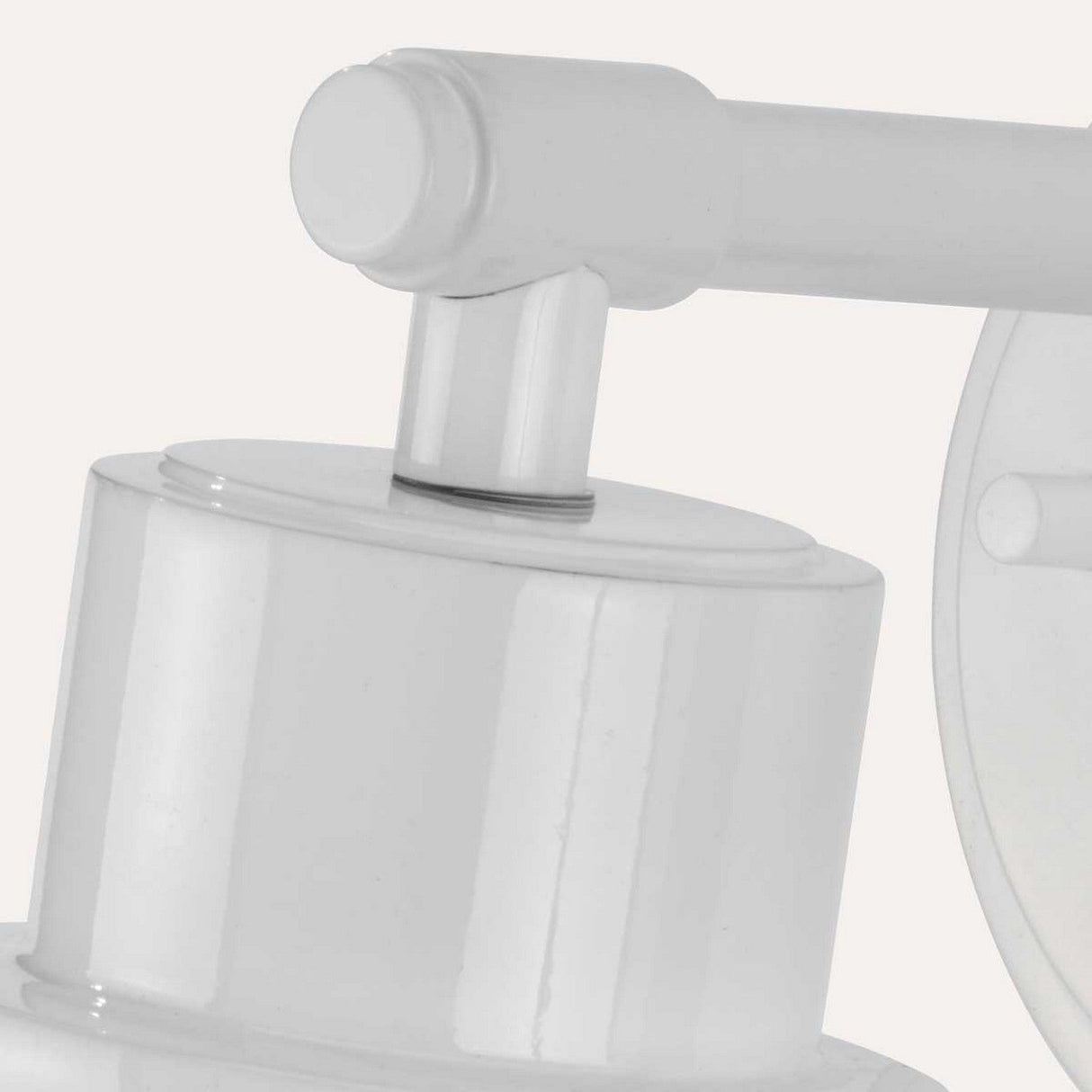 Close-up of a white Morvah 1 Light Outdoor Wall Light, highlighting its sleek cylindrical design and light-emitting feature against a light gray background. The image captures the simplicity and functionality similar to that of a modern LED Edison bulb's elegant design.