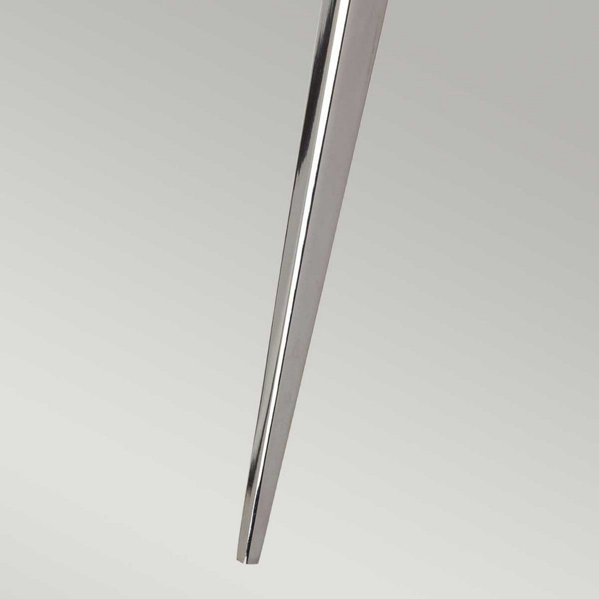 Close-up of the Verity 1 Light Wall Light with a polished chrome finish, set against a plain, light gray background.