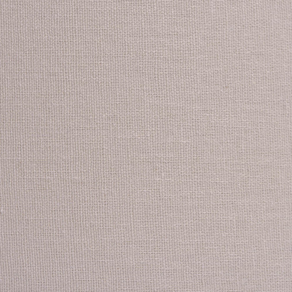 Close-up of the Endon Bevhurst 20cm tapered lamp shade showing its cream linen-effect fabric weave.