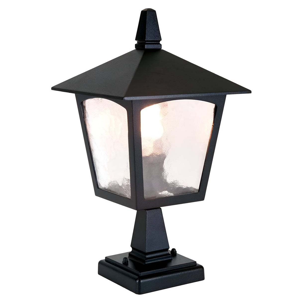 Introducing the York 1 Light Pedestal Light - Black, a lantern-style outdoor light fixture with a square base made from die-cast aluminum. It boasts frosted glass panels and a pointed top, offering vintage charm and emitting a soft, warm glow.